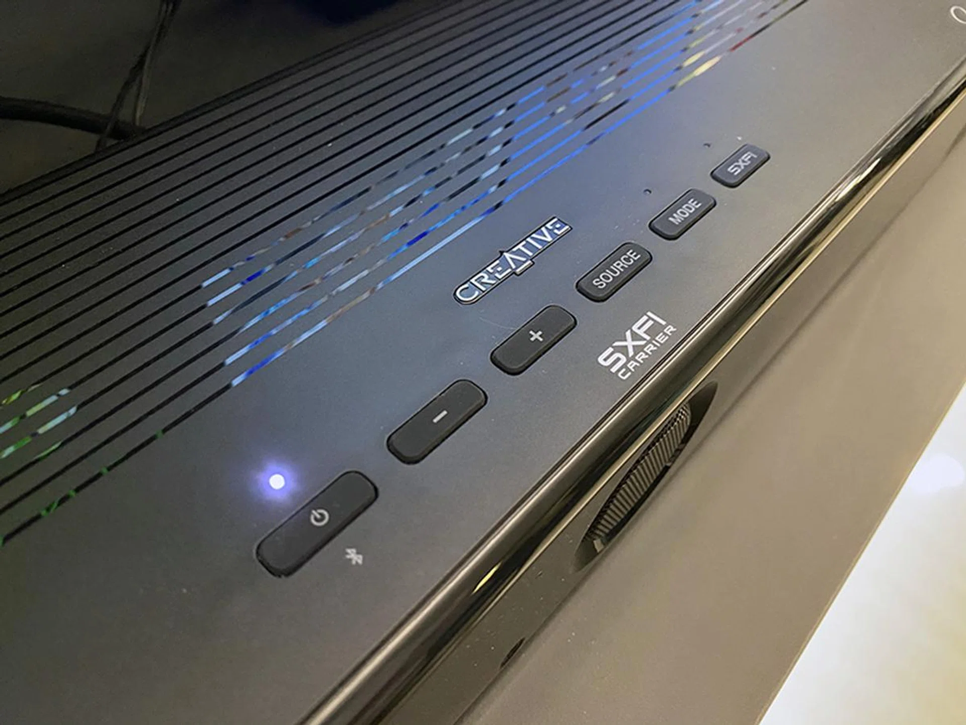 The SXFI Carrier has a nice soft plastic finish with glossy lines running its length. 