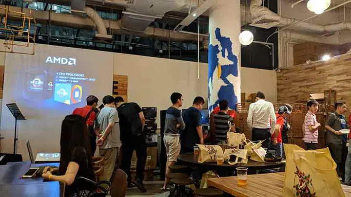 Attendees checking out the lucky draw prizes.