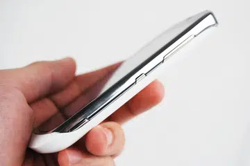 Three buttons (from bottom up: camera shutter, power control and volume controls) are situated on the right side of the Nokia Lumia 610. While they are slightly raised, we feel that the power button (center) could be made larger for easier use.