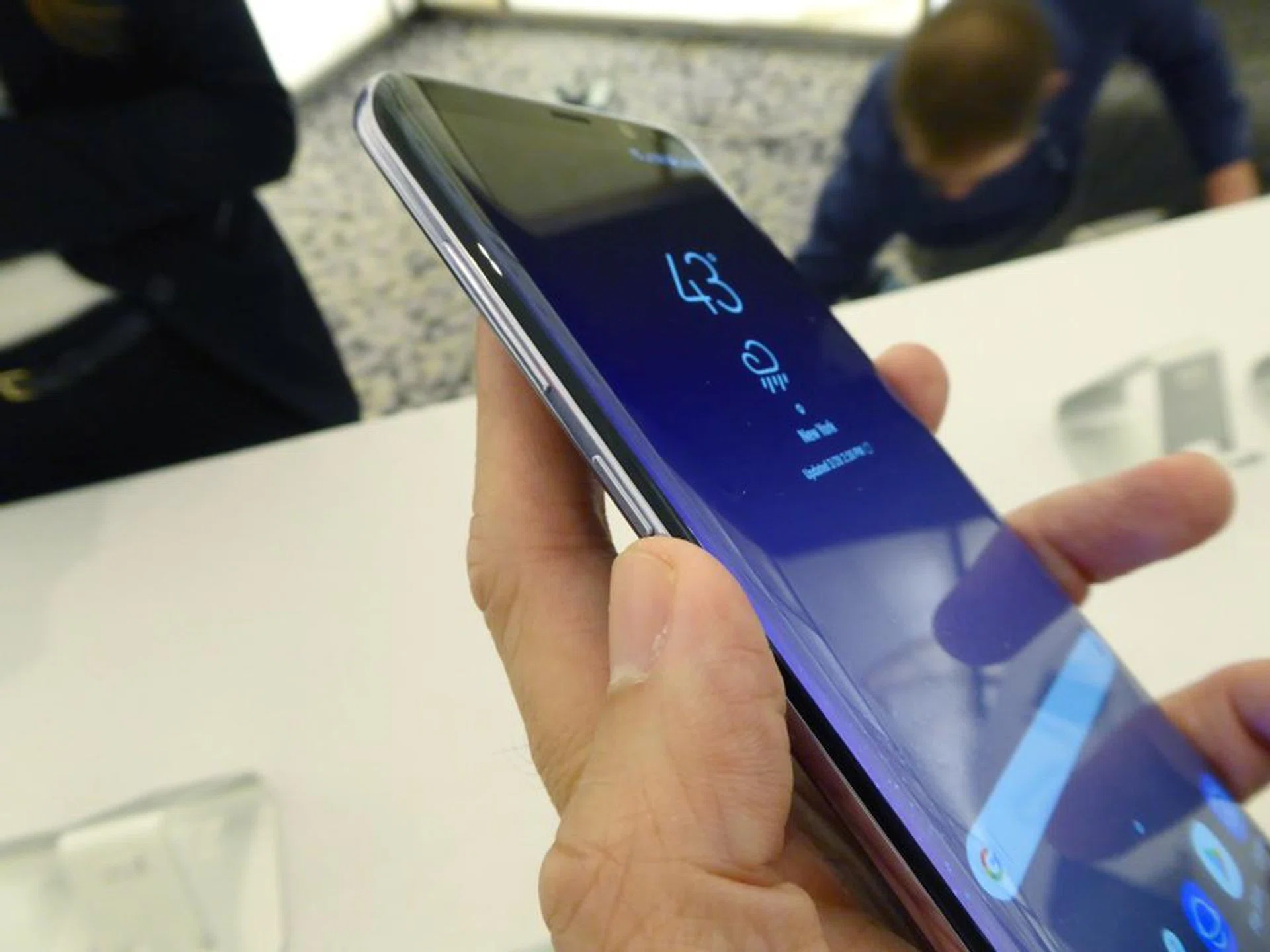 On the left, the longer button on the top is the volume rocker, while the smaller button at the bottom is a dedicated Bixby activation button (we'll get to Bixby later on page 3).