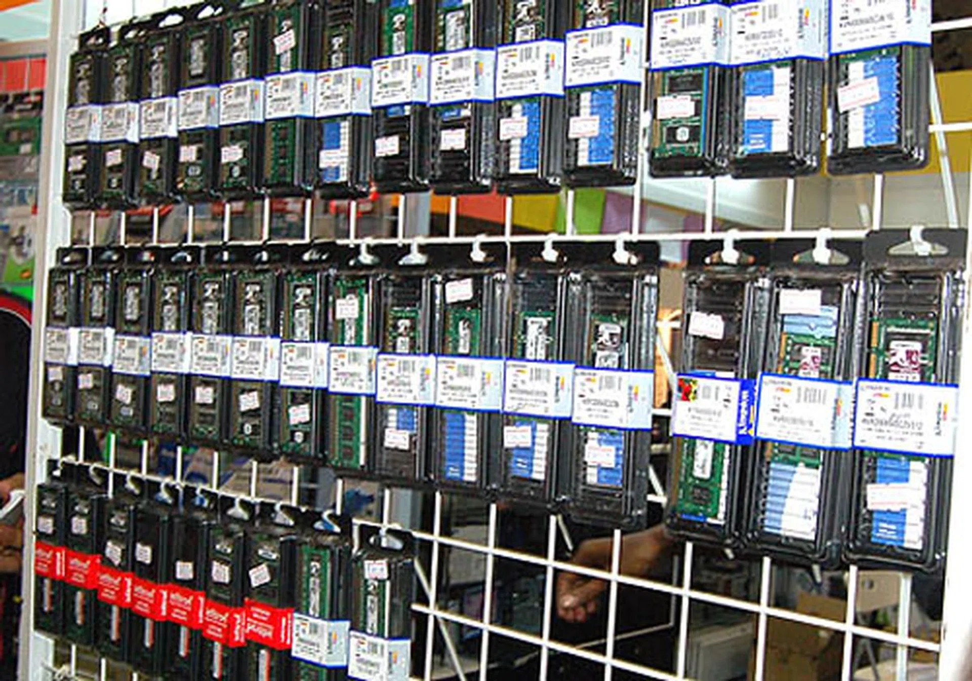  Row after row of computer memory sticks going for great prices are neatly laid outside Active Foto's booth (6271).  