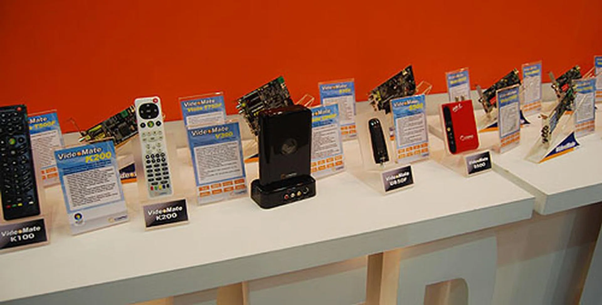 A sample of the many varied models of TV and media center related products from Compro. Form factors range from standalone set top boxes to USB dongles that can receive digital TV over the air.