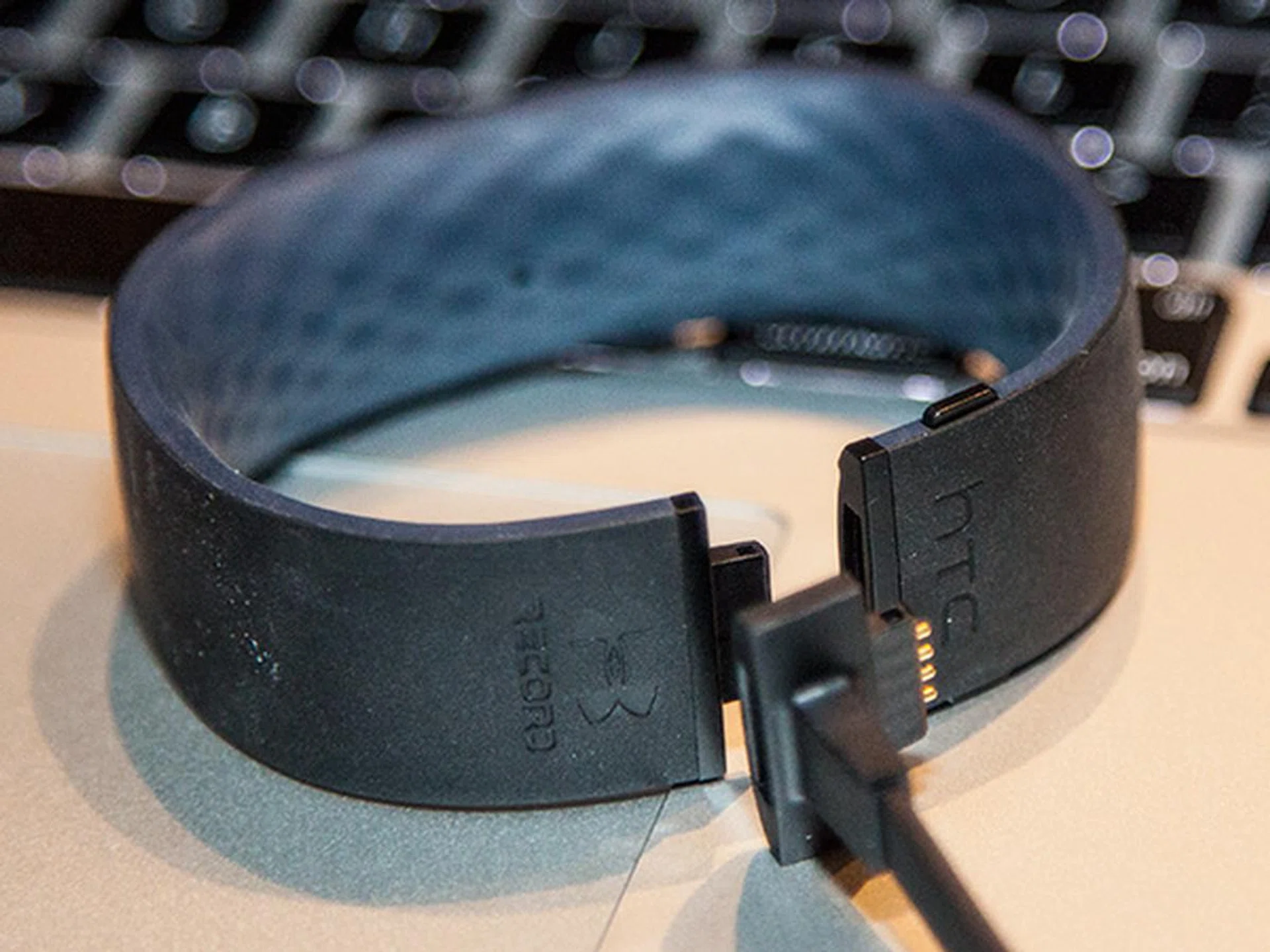 You'll need a special charger cable to juice up the HTC grip.