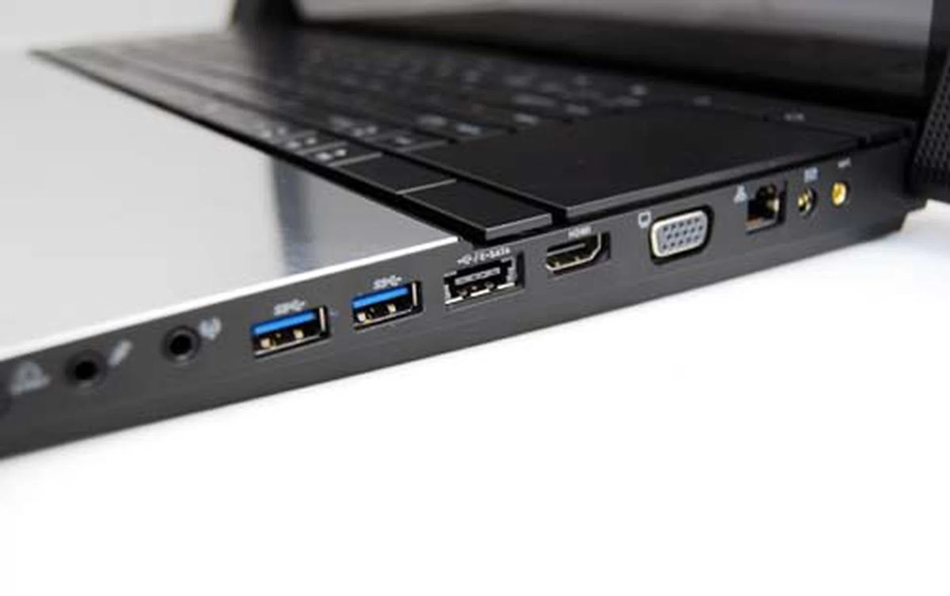 You won't be lacking for ports here on the right side with two USB 3.0 ports, one e-SATA/USB combo port, a HDMI port, VGA out and the audio jacks.