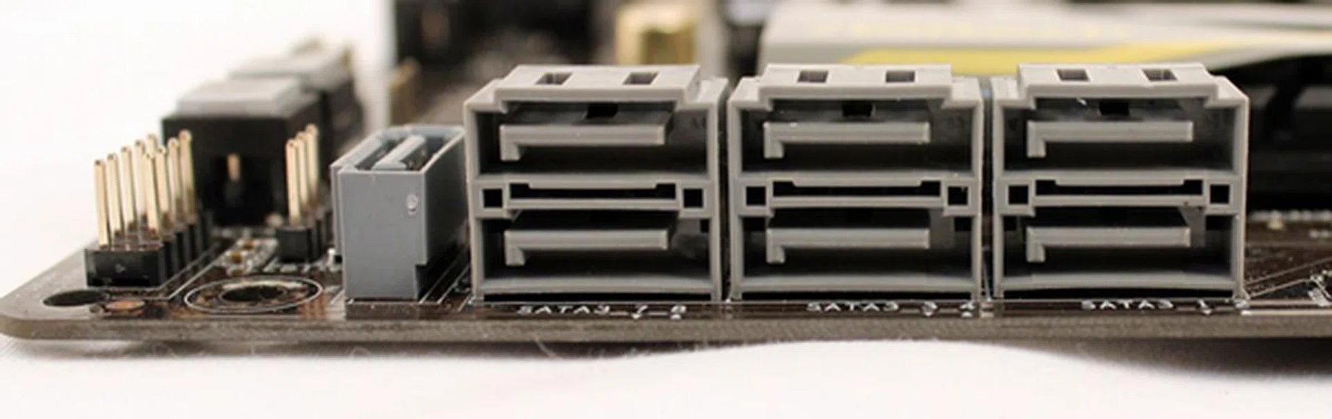 Shown here are the seven SATA 6Gbps connectors, courtesy of the AMD A85X chipset. The chipset supports eight SATA 6Gbps connectors and the eighth one is featured at the rear I/O panel as an eSATA port.