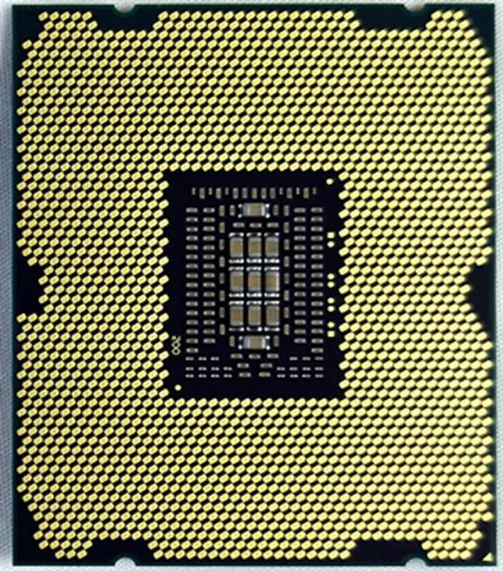 Pictured here is the Intel Core i7-3960X CPU, with its contact pads, that is compatible with a LGA2011 CPU socket. The Intel Core i7-3970X processor will come in the same package.
