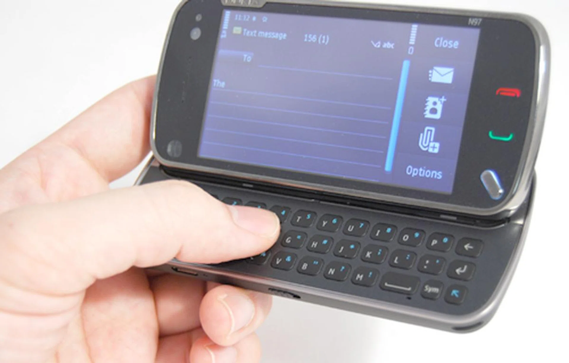 Flat keys, an oddly placed space bar, and navigation buttons located at the extreme left (hidden by the hand) corner. These are some of the things you'll need to get used to when it comes to typing on the N97. But once you do, messaging will be as easy as ABC.
