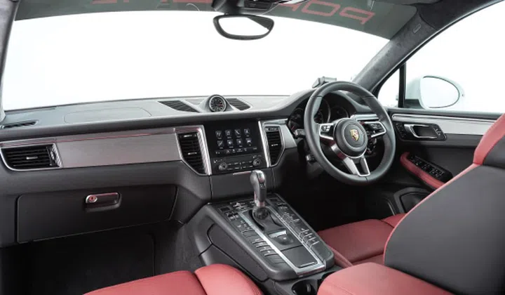 The dashboard is modern and functional. The center console, however, is a button fest. (Image source: Porsche Asia Pacific)