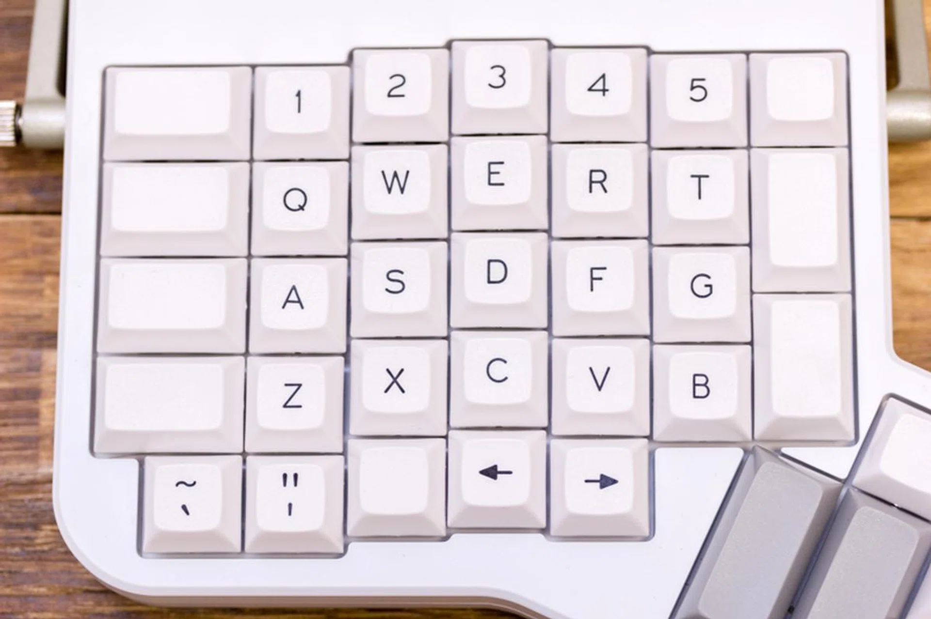 The keys are ortholinear; staggered to fit the varying lengths of your fingers.
