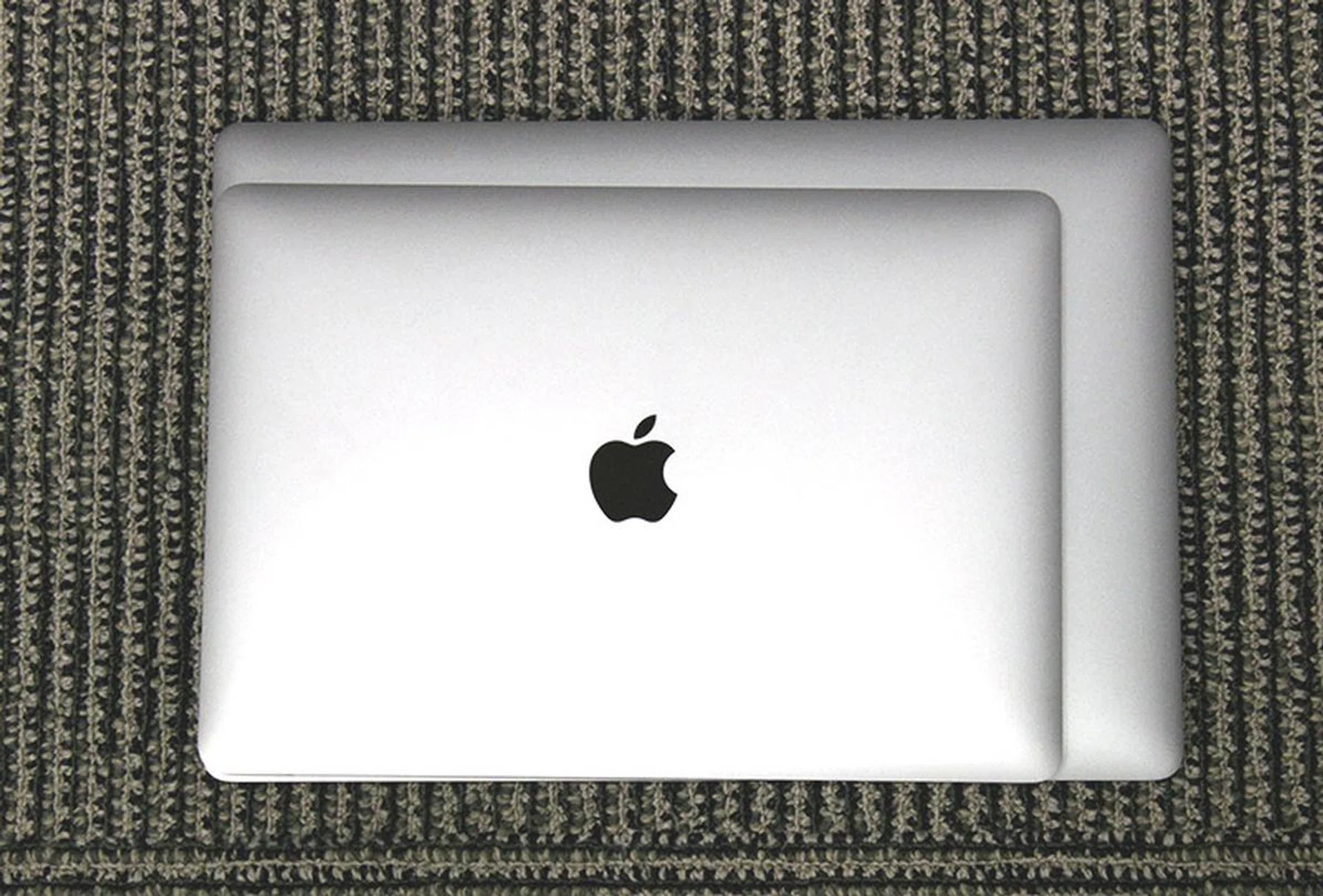 The 15-inch MacBook Pro is larger than the13-inch model, though not by very much.