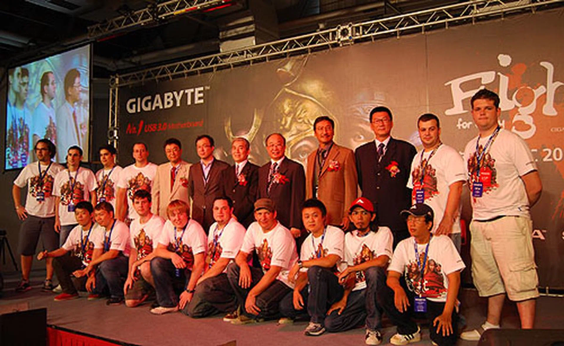 The competitors taking the stage for a photo opportunity with the VIPs, including representatives from the sponsors like Intel, AMD and Seagate.