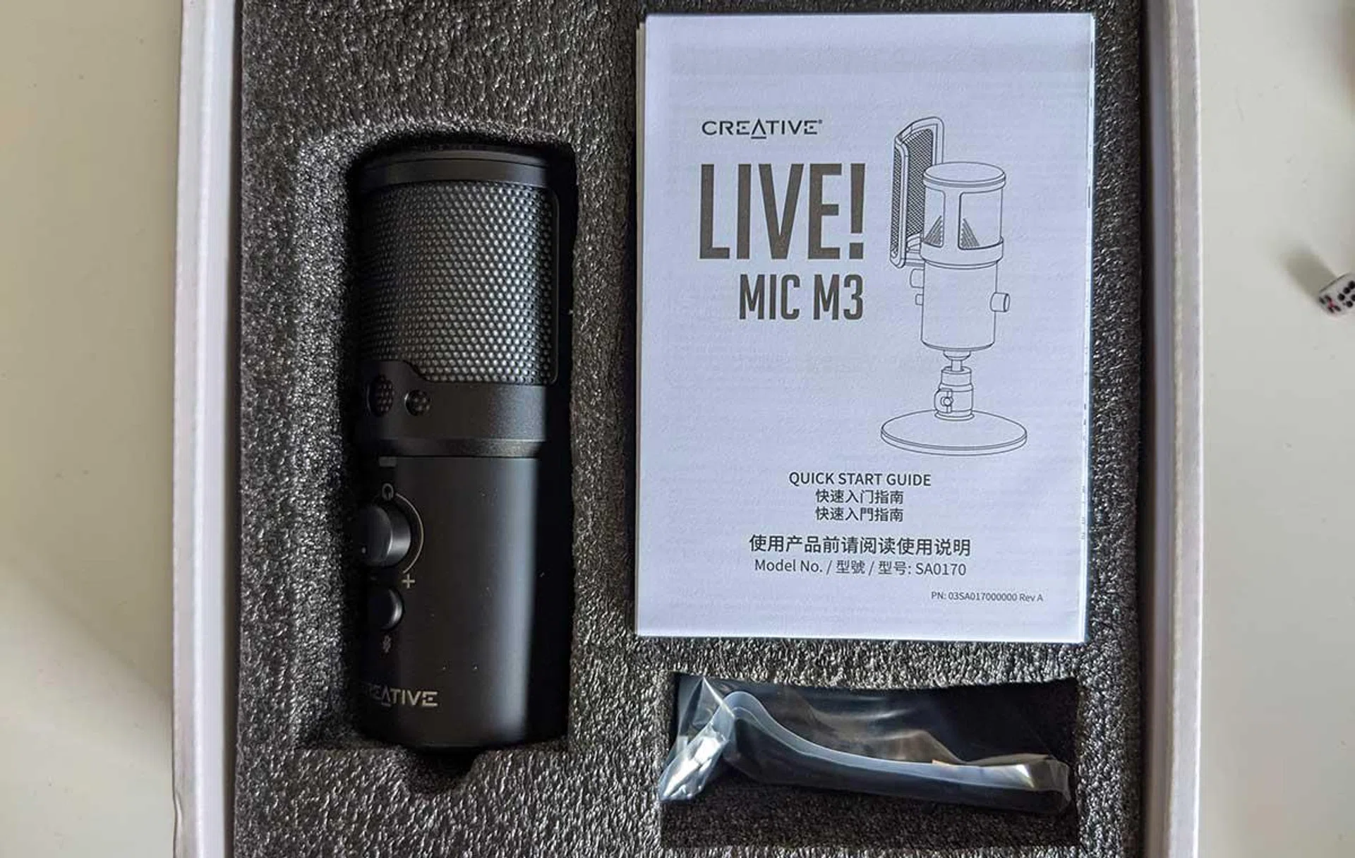 What you get in the box, with the desk stand under the quick start guide.