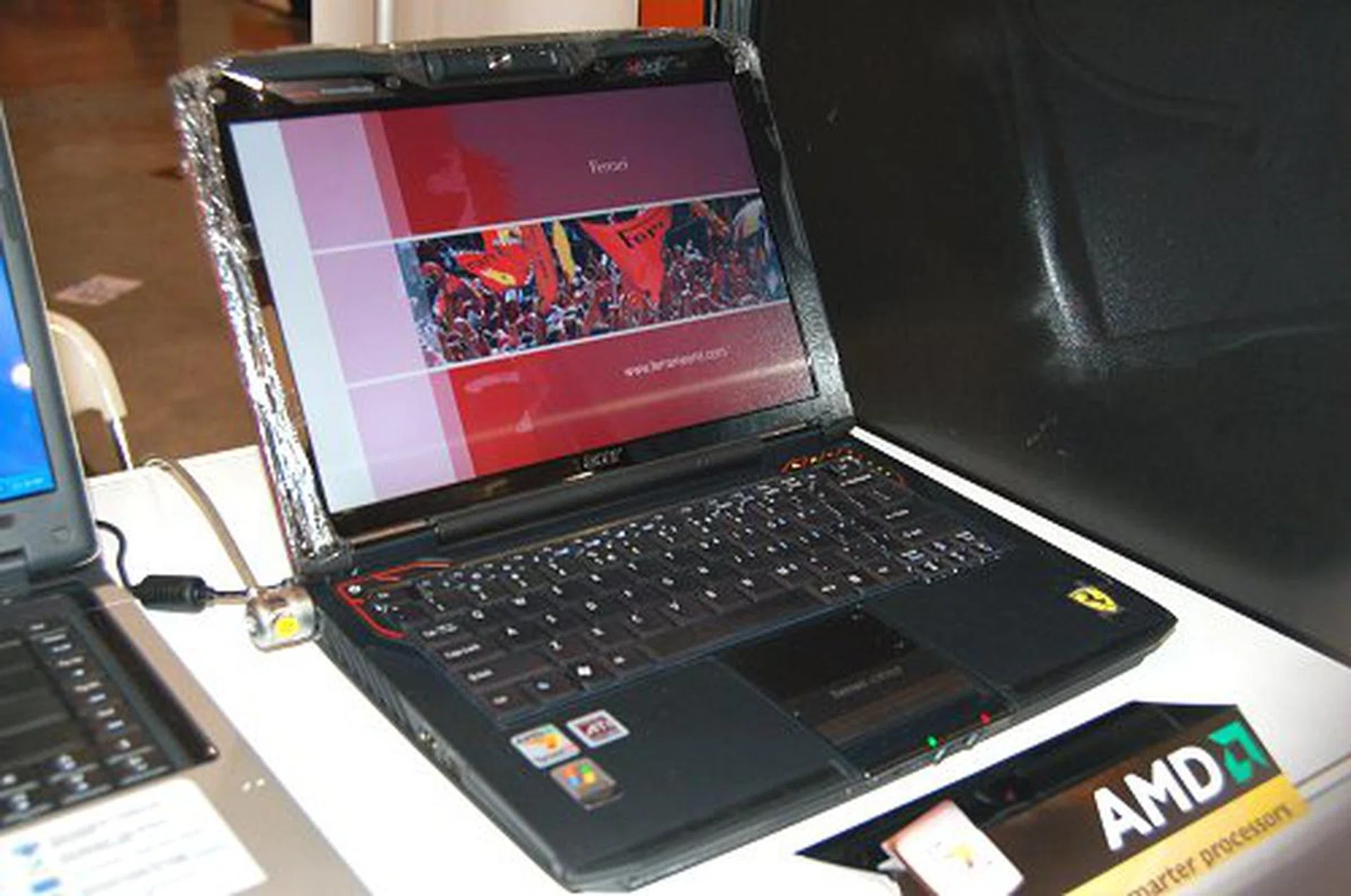 The iconic Acer Ferrari 1004WTMi notebook on sale running the AMD Turion 64 X2 TL56 (1.8GHz) CPU, 1GB DDR2 RAM, 120GB HDD, Radeon Xperss 1150 GPU, HD Audio and 1.3MP camera going for S$2998