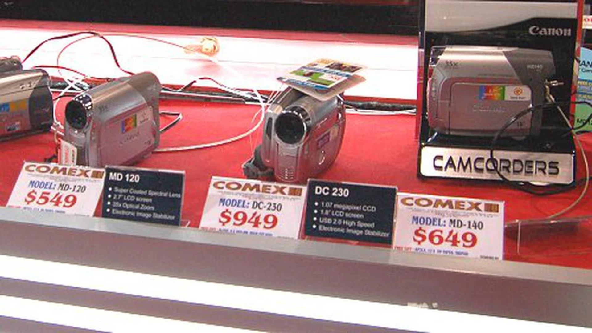  Canon also has its whole range of DVD and MiniDV camcorders on sale at Comex as well. Seen here from left to right, the entry-level MD-120 for S$549, the DC230 for S$949 and the MD140 which is going for S$649.  