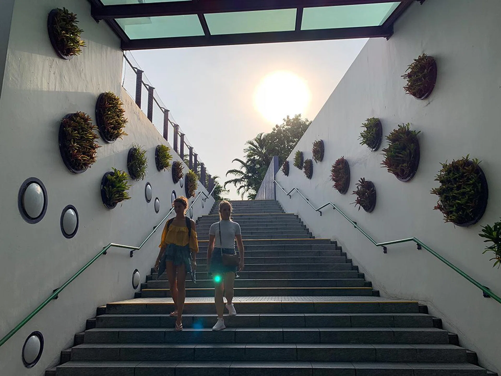 How Apple’s Smart HDR processes the shot. There’s more detail in the sky, but the backlit figures are still in shadow.