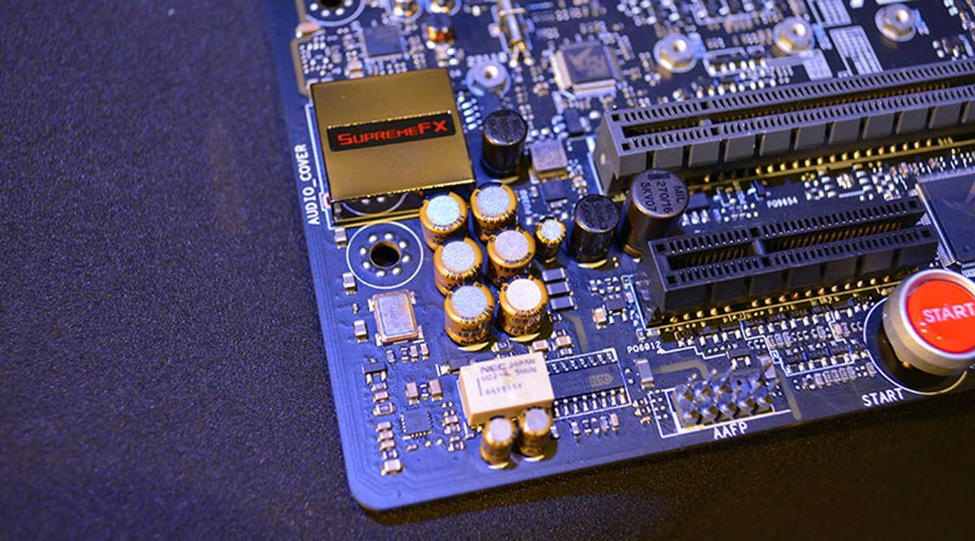 You can clearly see the gold-rimmed Nichicon capacitors, the NEC de-pop relay, and the ESS ES9023P DAC beside each other at the bottom.