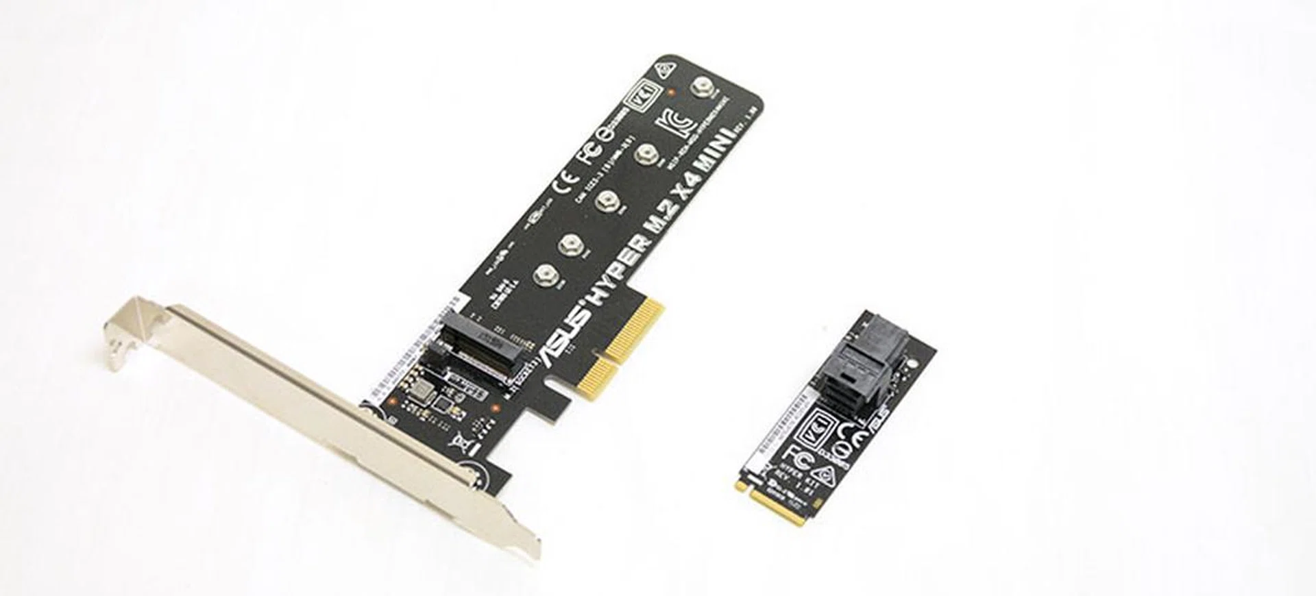 The board comes bundled with a Hyper M.2 PCIe add-in card (left) and a U.2-to-M.2 adapter (right).