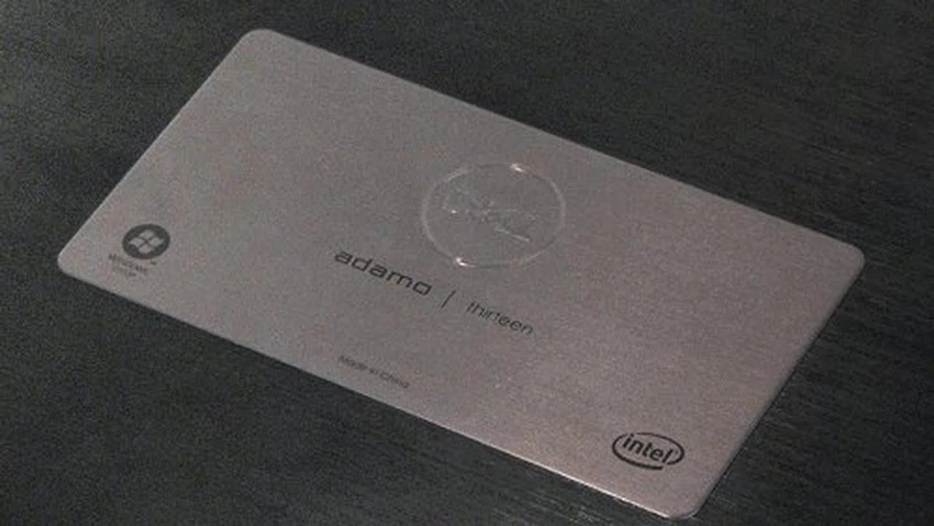 A closer look at the plaque reveals that this is Dell's solution to the requirement of having Intel and Windows stickers on the notebook.