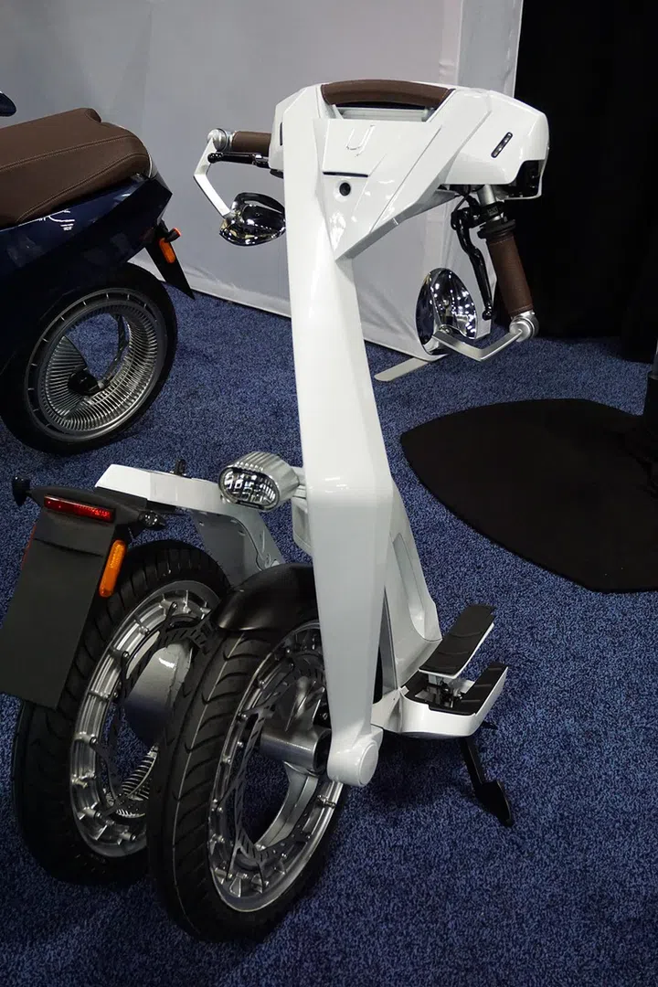The folded Ujet electric scooter without its battery pack.