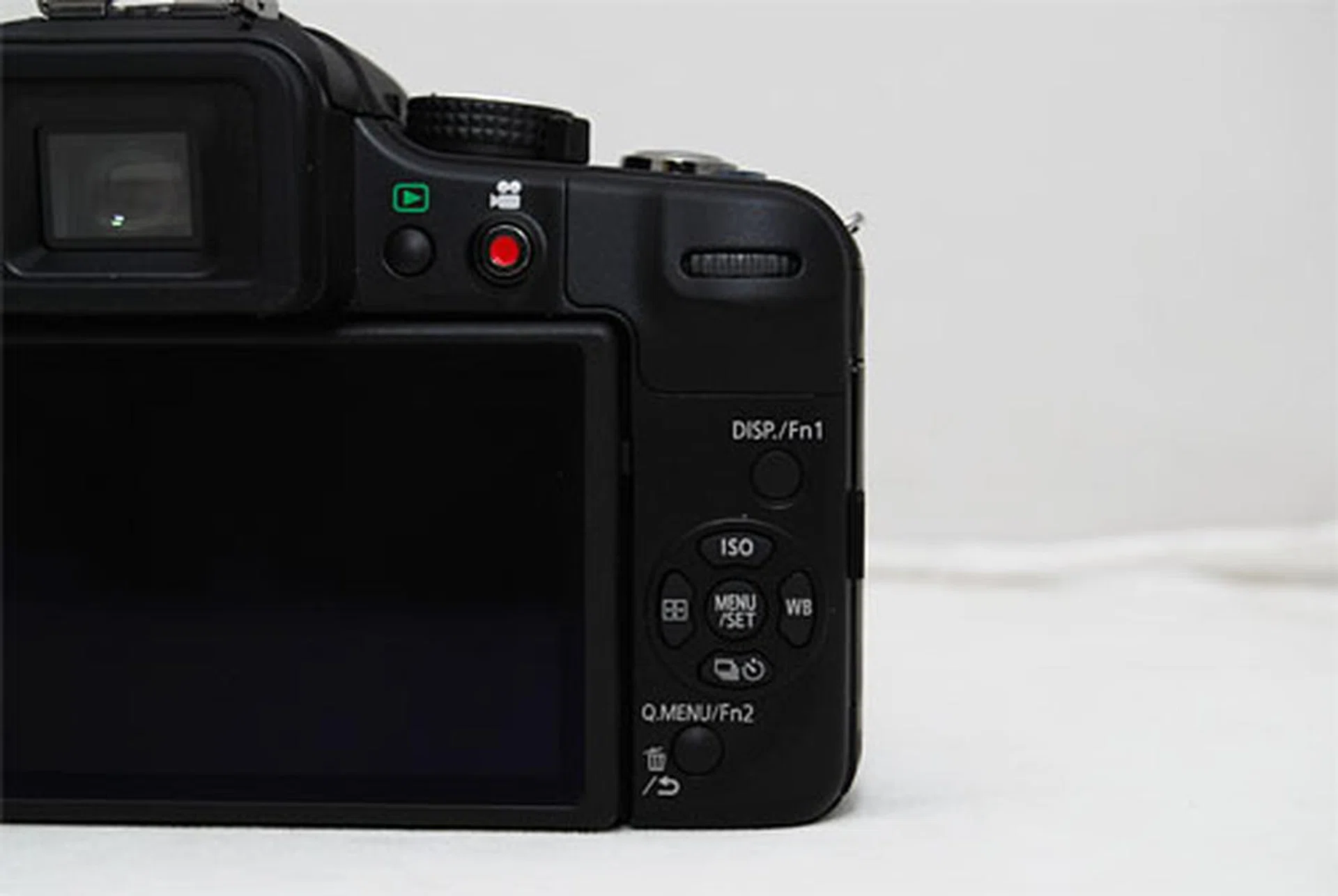 Now located on the back, the video Record and Play buttons are harder to reach.