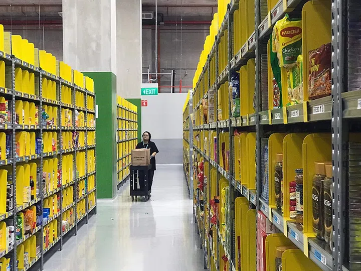 The system knows exactly where each and every item is located, and will chart the best route for the associates to pick up the products. Chilled items get picked up last, for obvious reasons.