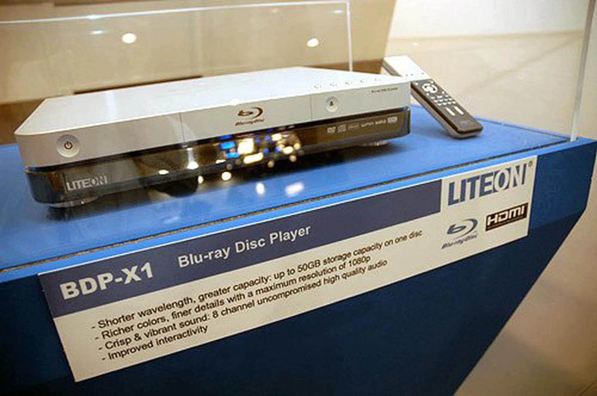 For the first time, Taiwan-based optical disc drive manufacturer Lite-On showed its Blu-ray Disc playback device on top of showcasing its HD-DVD players. The BDP-X1 is a Blu-ray Disc player that supports 25/50GB Blu-ray disc playback on top of DVD-Video. Supported media include BD-ROM, BD-R, BD-RE, DVD-RAM, DVD-R/RW, DVD+R/RW, among other formats. Audio support includes Dolby Digital Plus, Dolby TrueHD, DTS and DTS-HD. The player has optional connectivity for Ethernet, USB 2.0 with HDMI, Component out and digital audio out, among a few others.