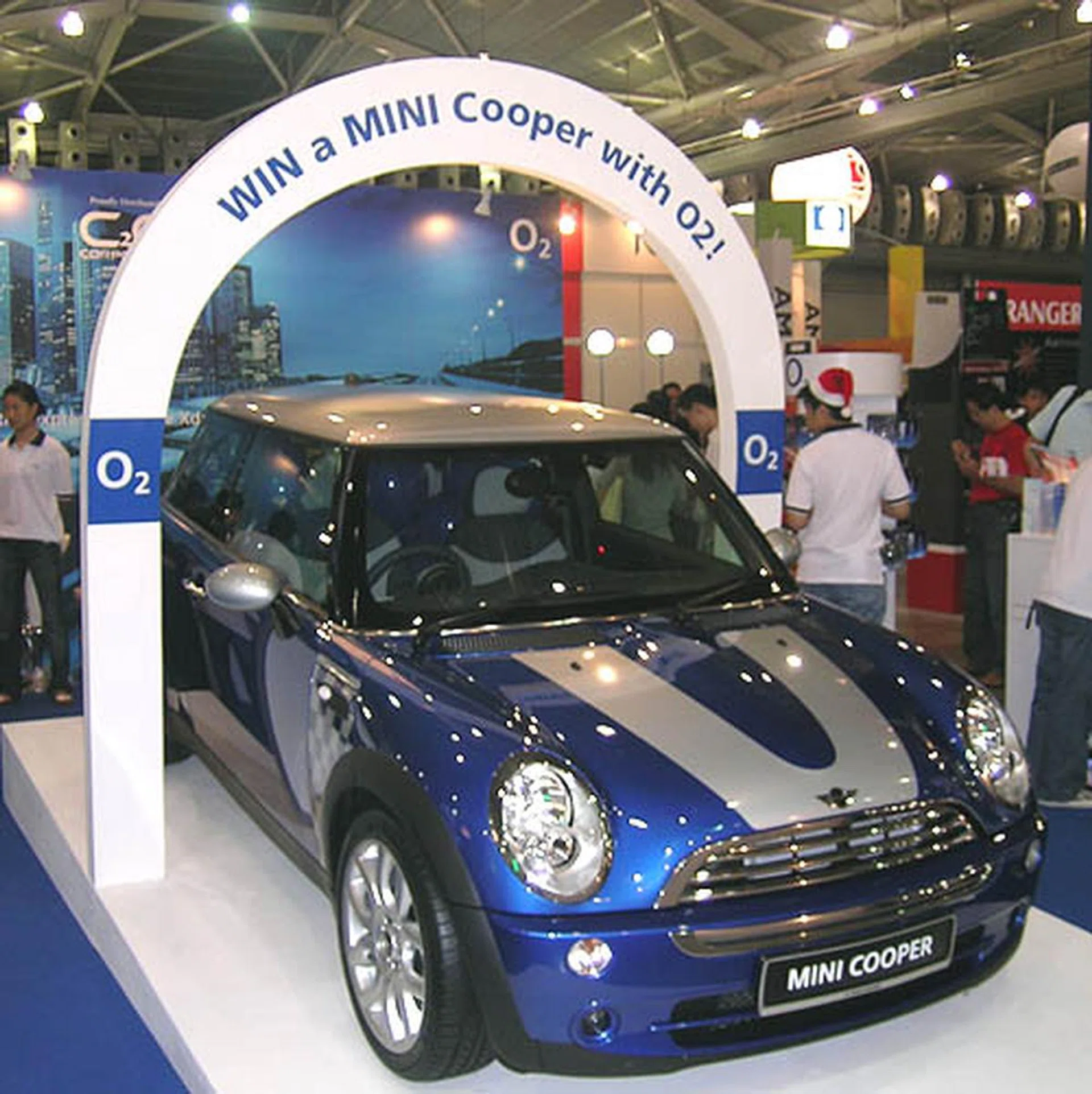 The banner says it all - a chance to win a Mini Cooper by purchasing a O2 product.