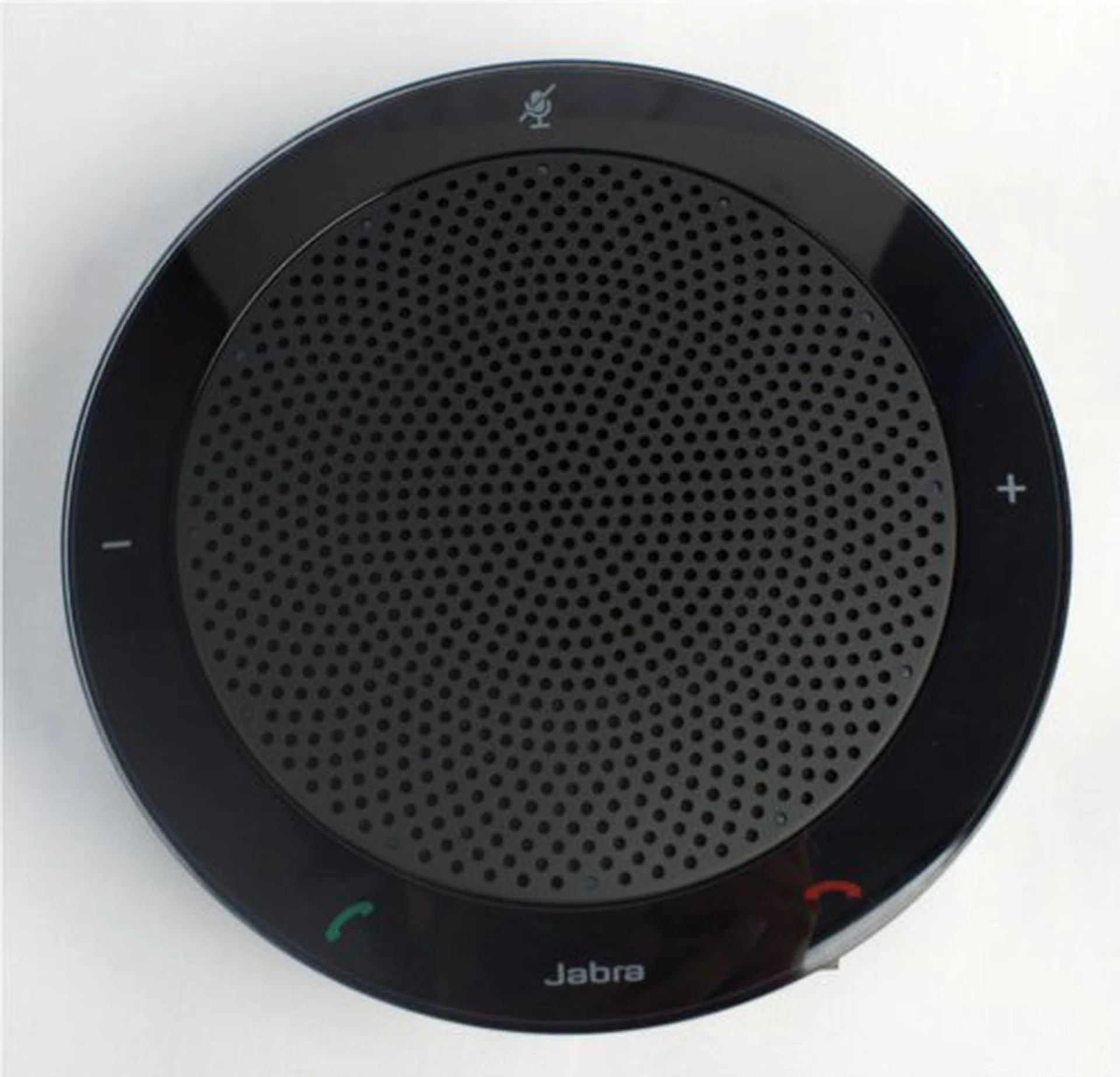 The metal grill takes up most of the surface real estate and it is ringed by buttons for call and volume controls. 