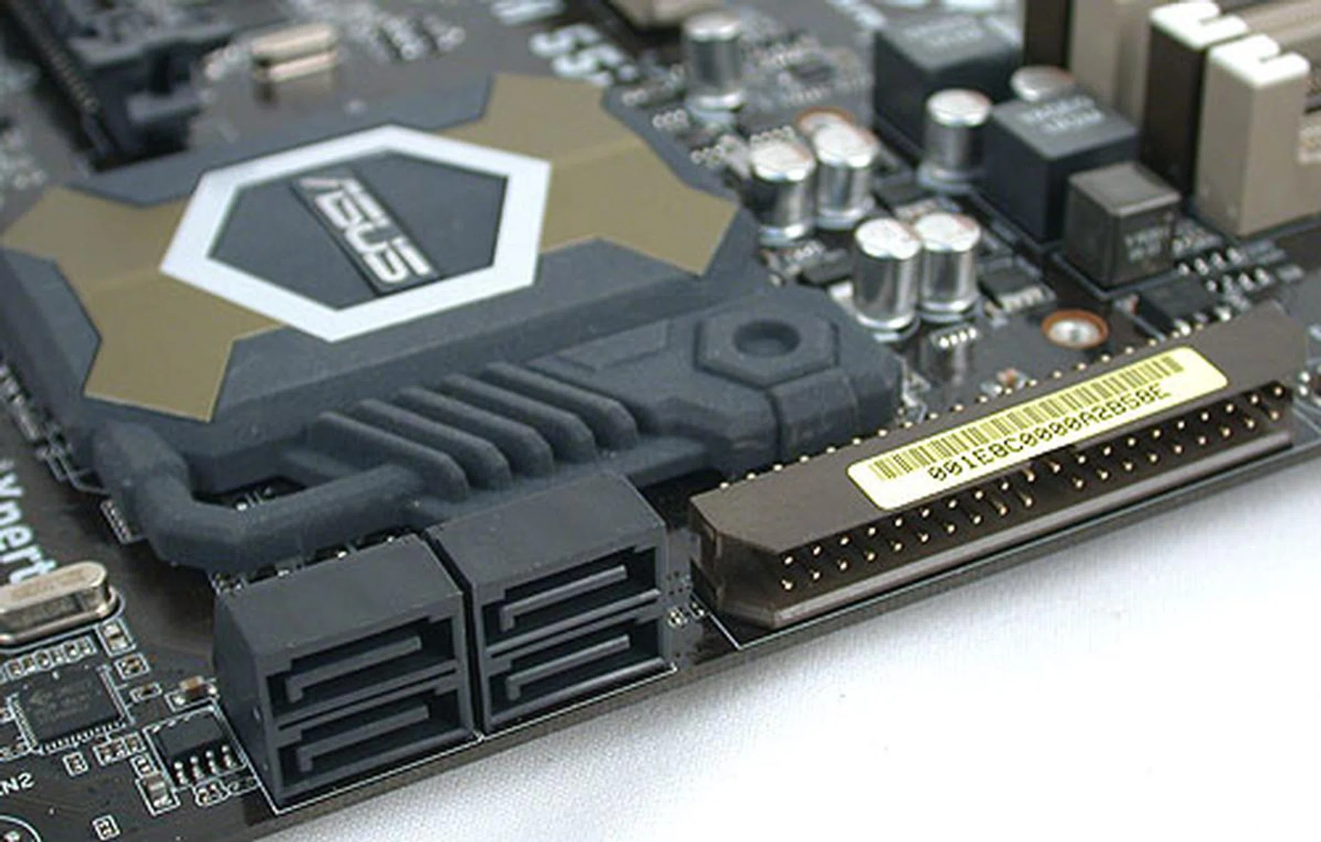 The SATA ports in black are the ones from the Intel P55 Express chipset. ASUS has kept with the IDE connector with the addition of a JMicron controller.