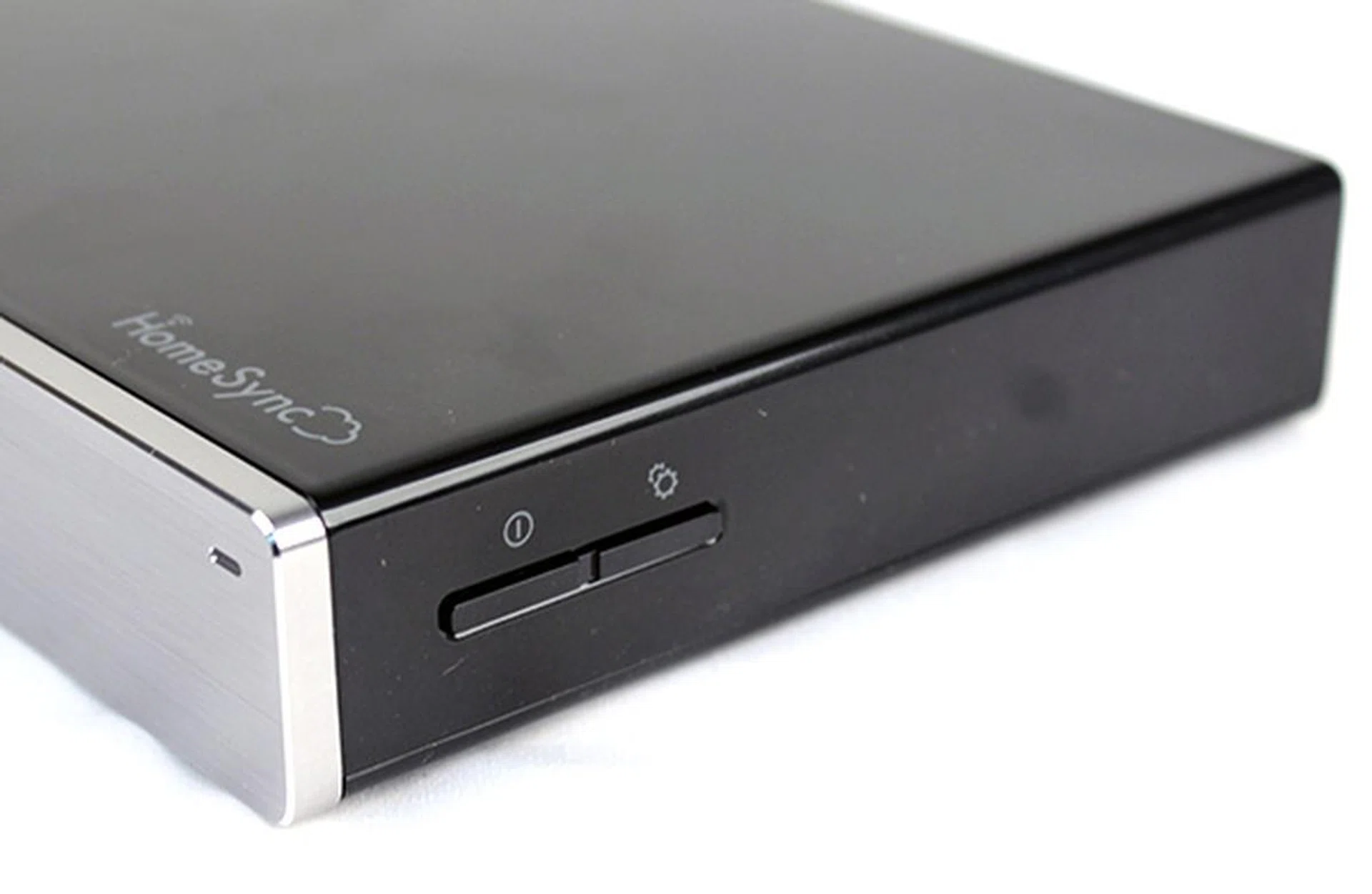 To keep the front brushed aluminum panel clean, Samsung has positioned the buttons on its side, and there's only two of them.