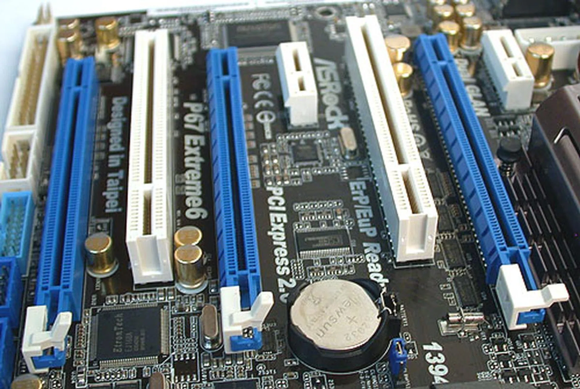 There may be three PCIe 2.0 x16 slots but the leftmost slot is capped at x4 speeds. Dual cards will be configured at x8/x8.