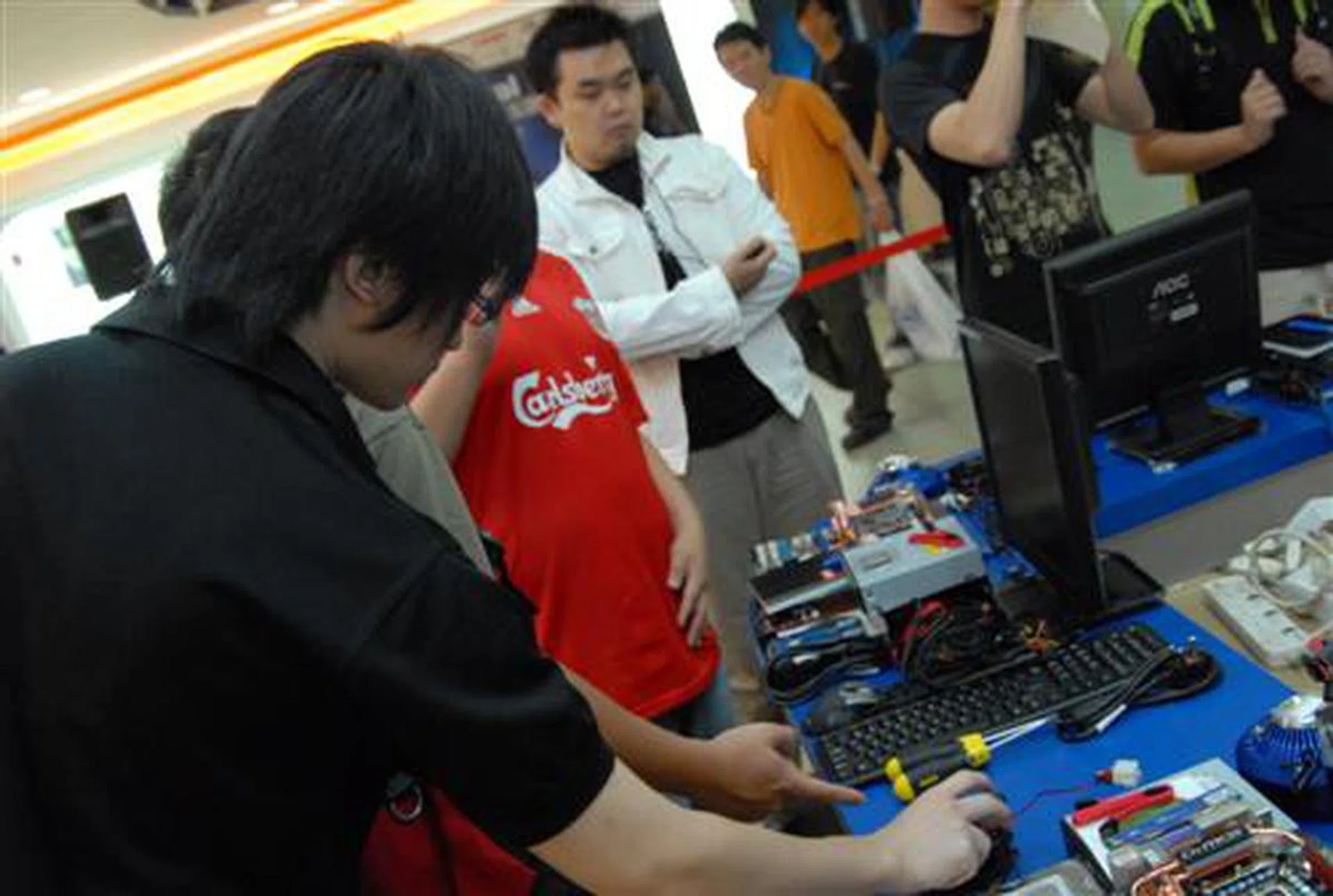  The contestants looking at the hardware for their competition.  