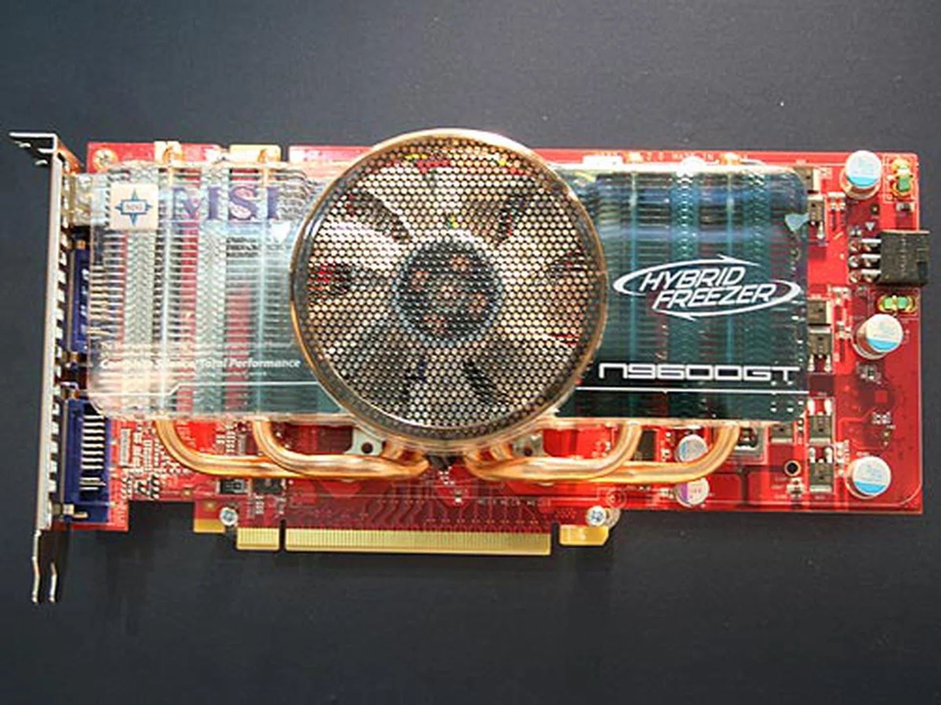  The MSI N9600GT Hybrid Freezer graphics card is based on the NVIDIA 9600GT chip. The cooler is a specially designed heatsink with as many as four heatpipes integrated with a large fan. The hybrid freezer card comes with a built-in sensor that detects the GPU temperature and load, such that if it's being used in 2D mode, the fan will not spin and cooling will be done passively through the heatpipes and large heatsink. In 3D mode, the fan will kick in to help improve cooling.  