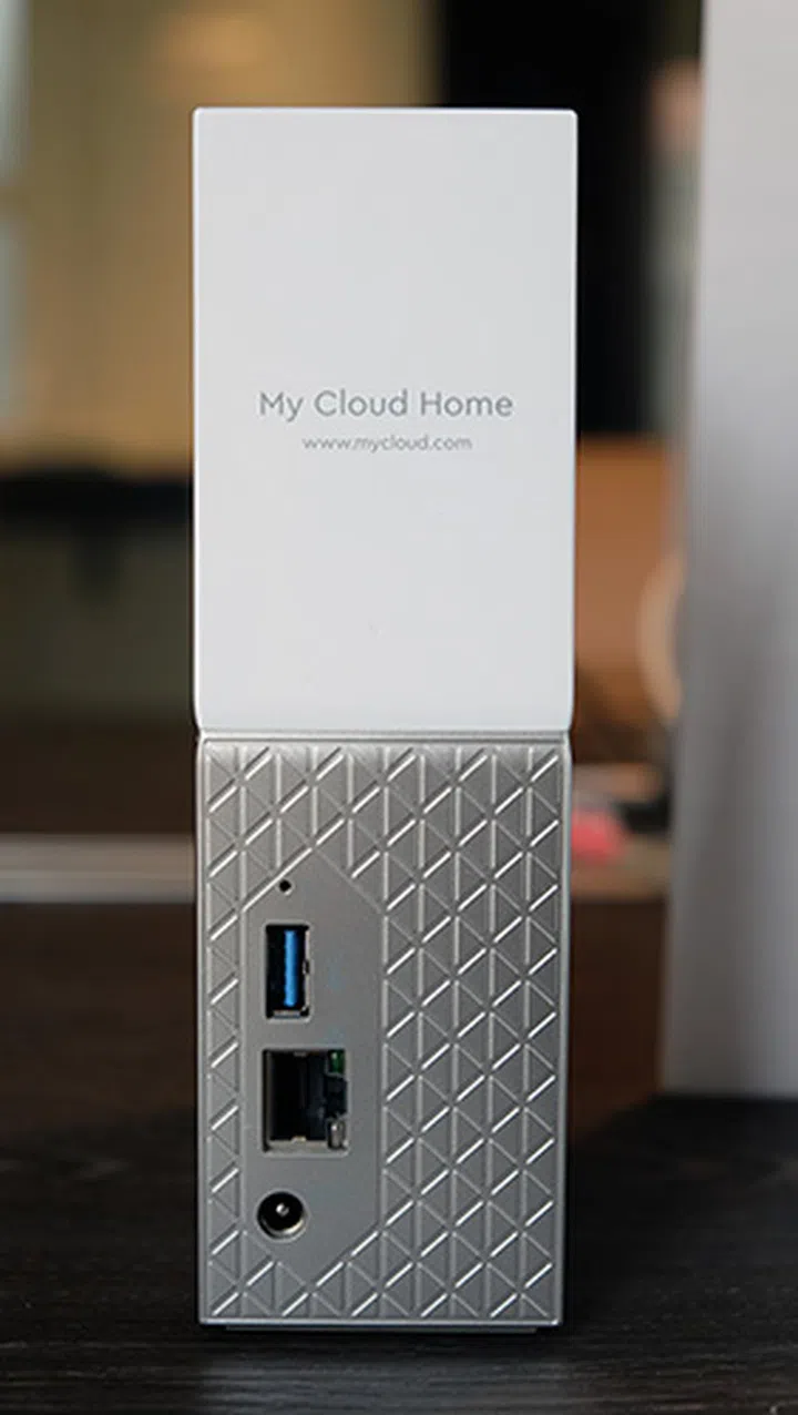 There's a USB port behind each device, but it can only be used to import content. You cannot expand storage via the USB port.