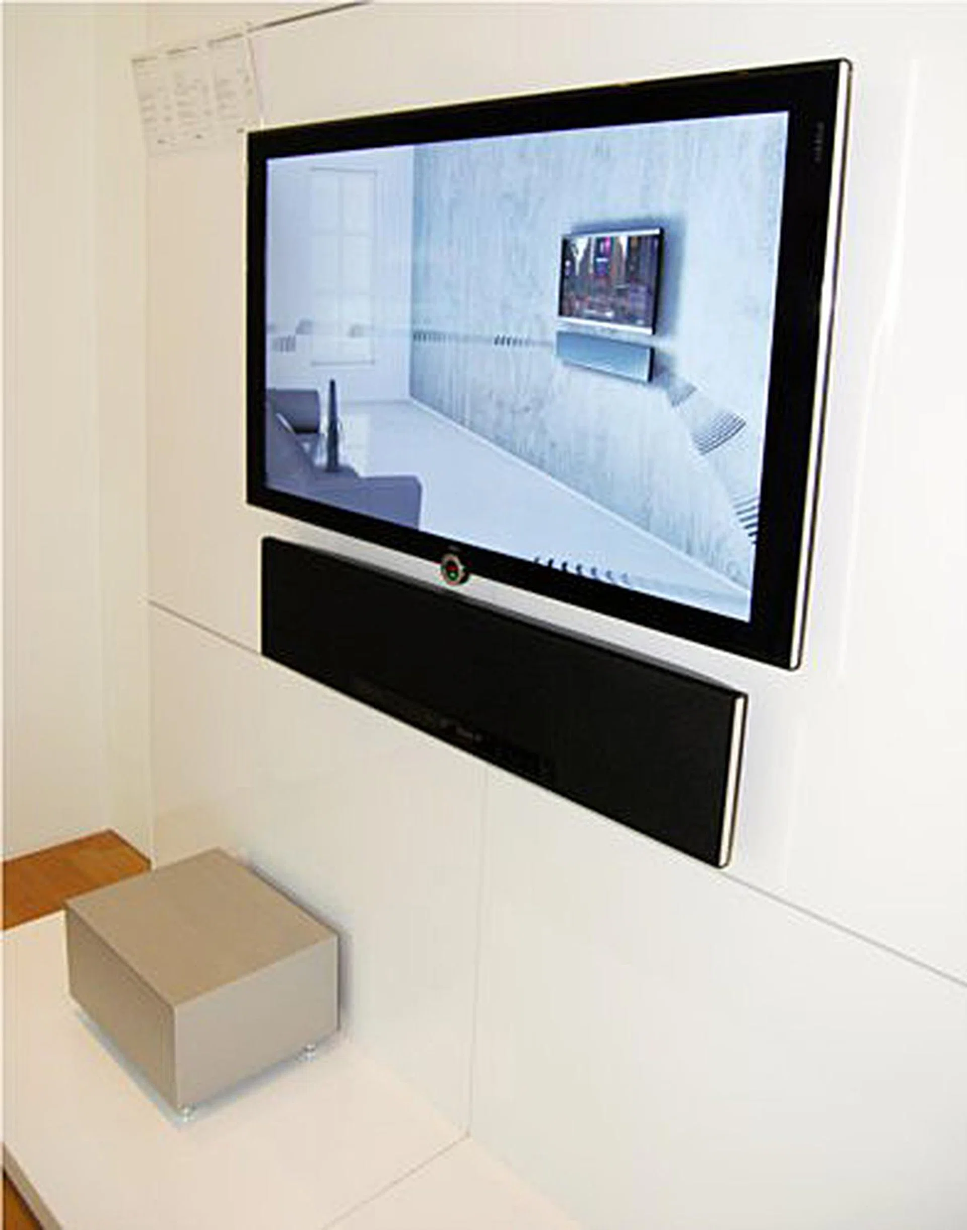 The 46-inch Loewe Individual Compose looks elegant in these pristine white environment. But the wide bezel is clearly evident around the display area which takes away from the looks in our opinion. Perhaps it was meant to mimic a picture frame in a well poised room.