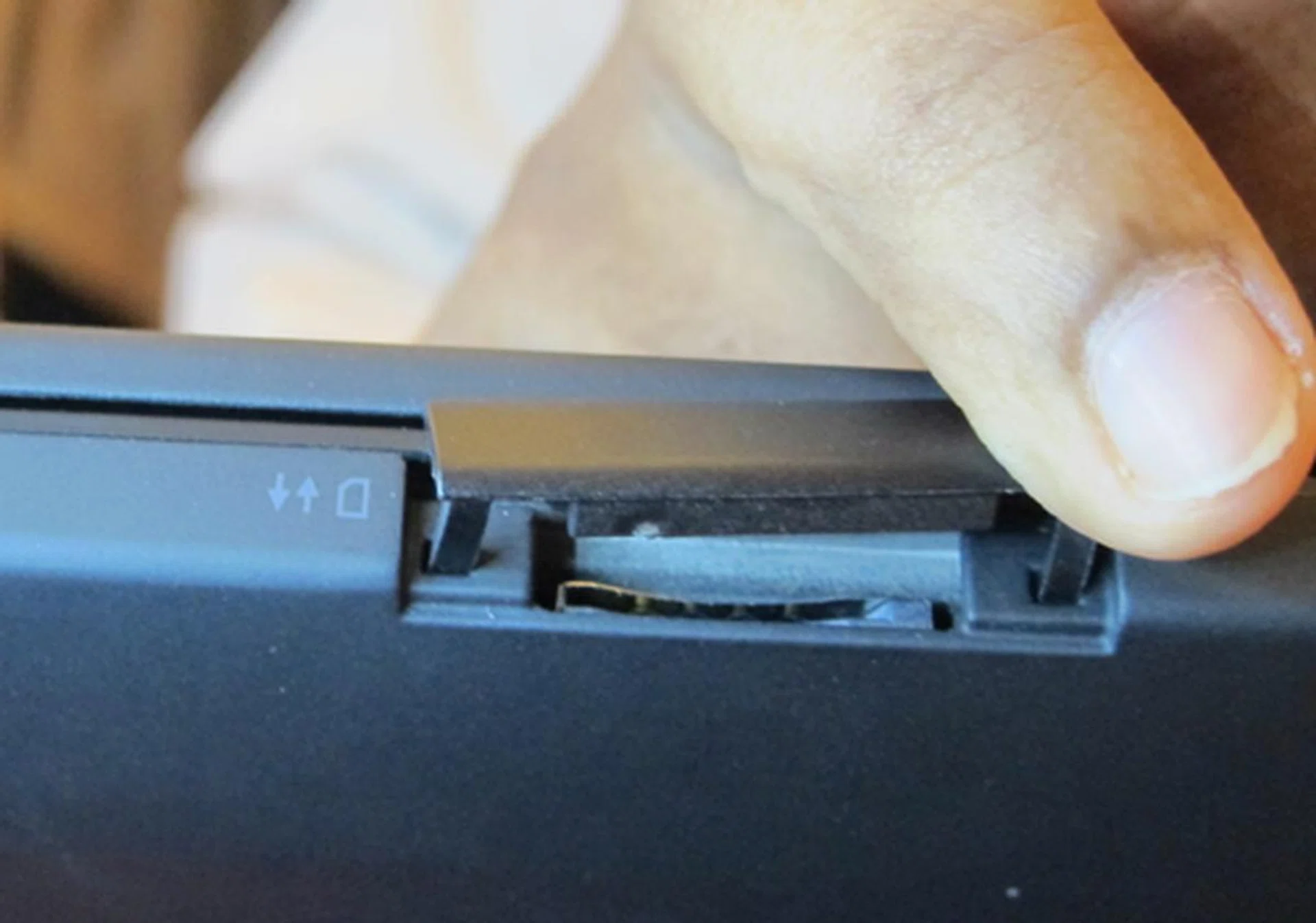 The sim card slot is found at the back of the machine. It's an optional feature, targeted at frequent travellers who need to be on the go, 24/7 and where Wi-Fi might not be an option all the time.