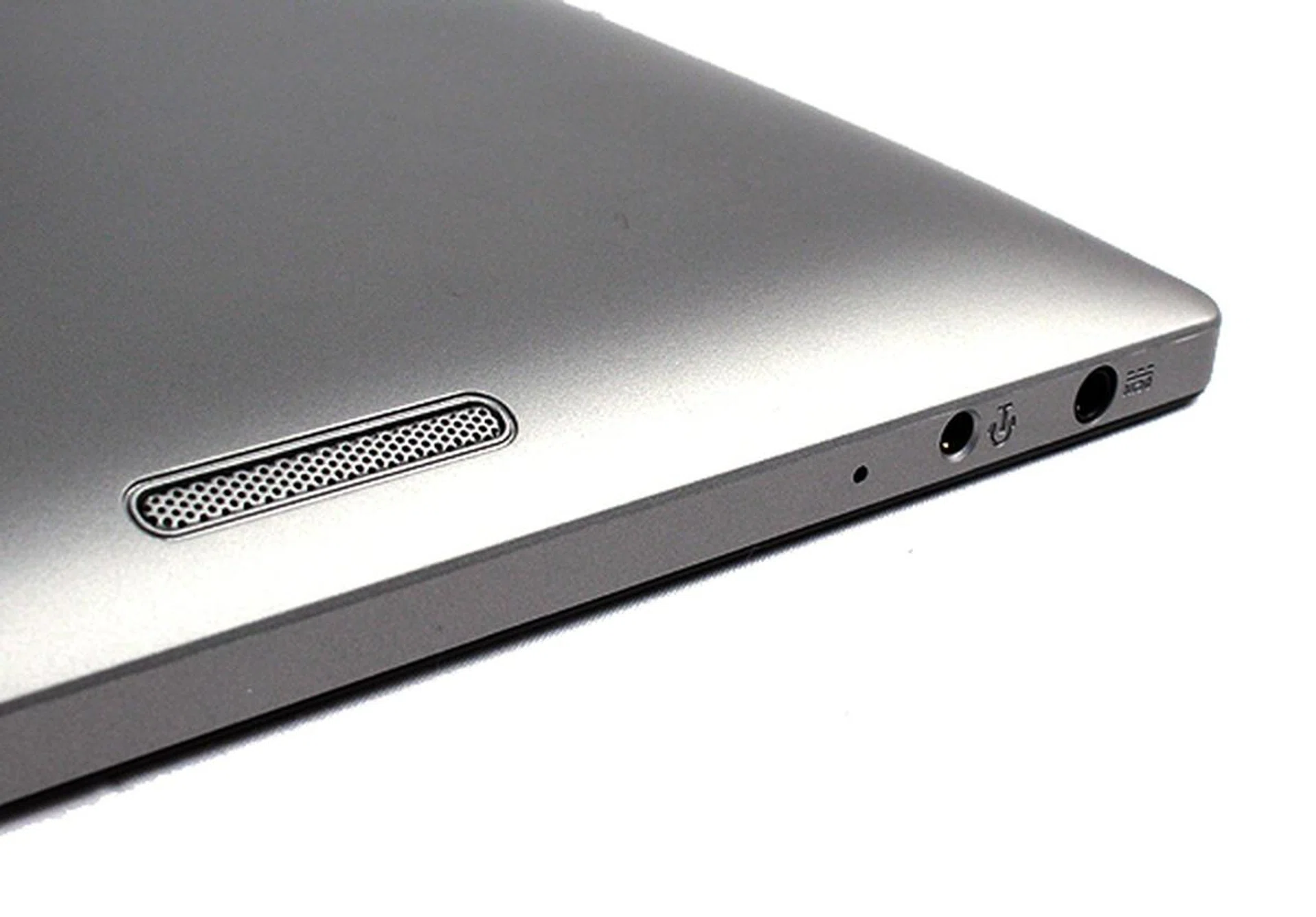Behind the tablet are two 1.5W speakers - one on each side. For discerning users, there's also a headphones jack. Below it, there's a DC-in jack for power.