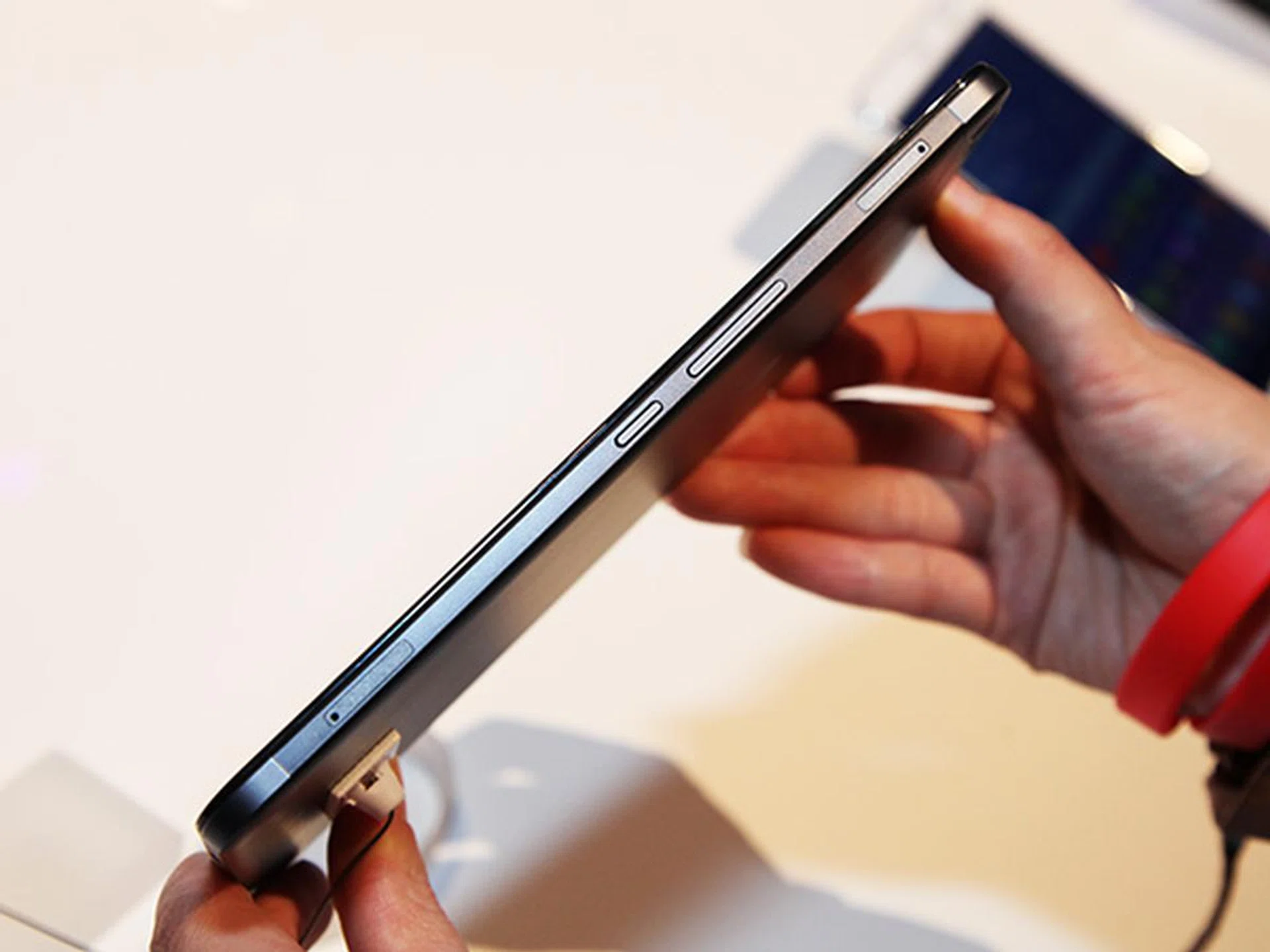 On the right flank of the device, you'll find the power and volume buttons, as well as slots for microSD and SIM cards.