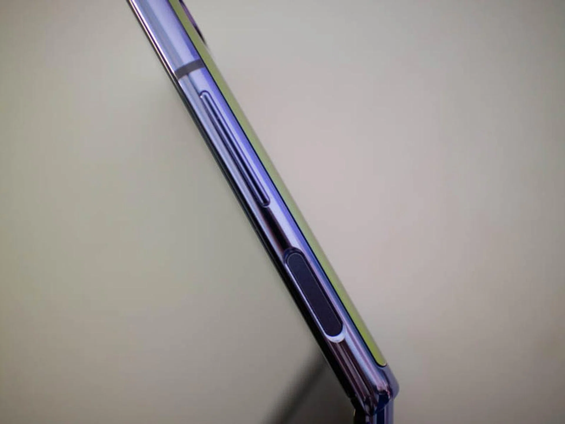 On the right profile of the phone, you'll find the volume rocker as well as the power button with an integrated fingerprint scanner.