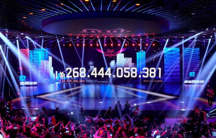 The screen shows the amount shoppers spent on Alibaba's online shopping platforms.(Image source: Reuters)