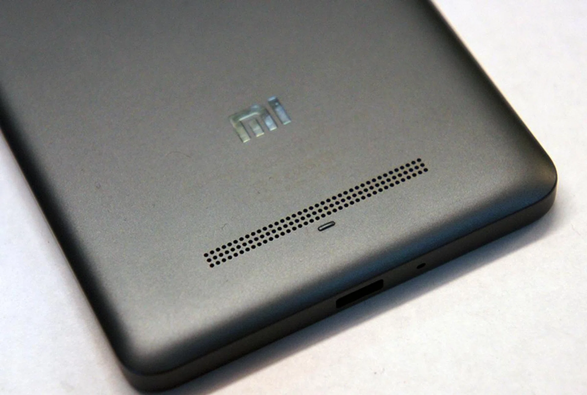 The Mi 4i's speakers are to the rear. Note also the soft-touch matte finish of our grey unit.