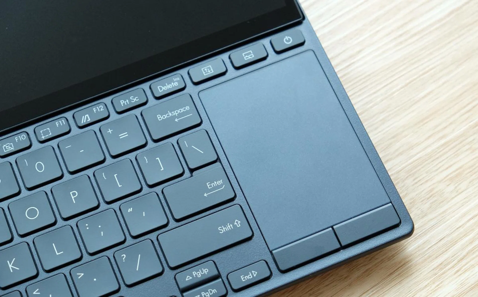 The trackpad is small and in the wrong place.