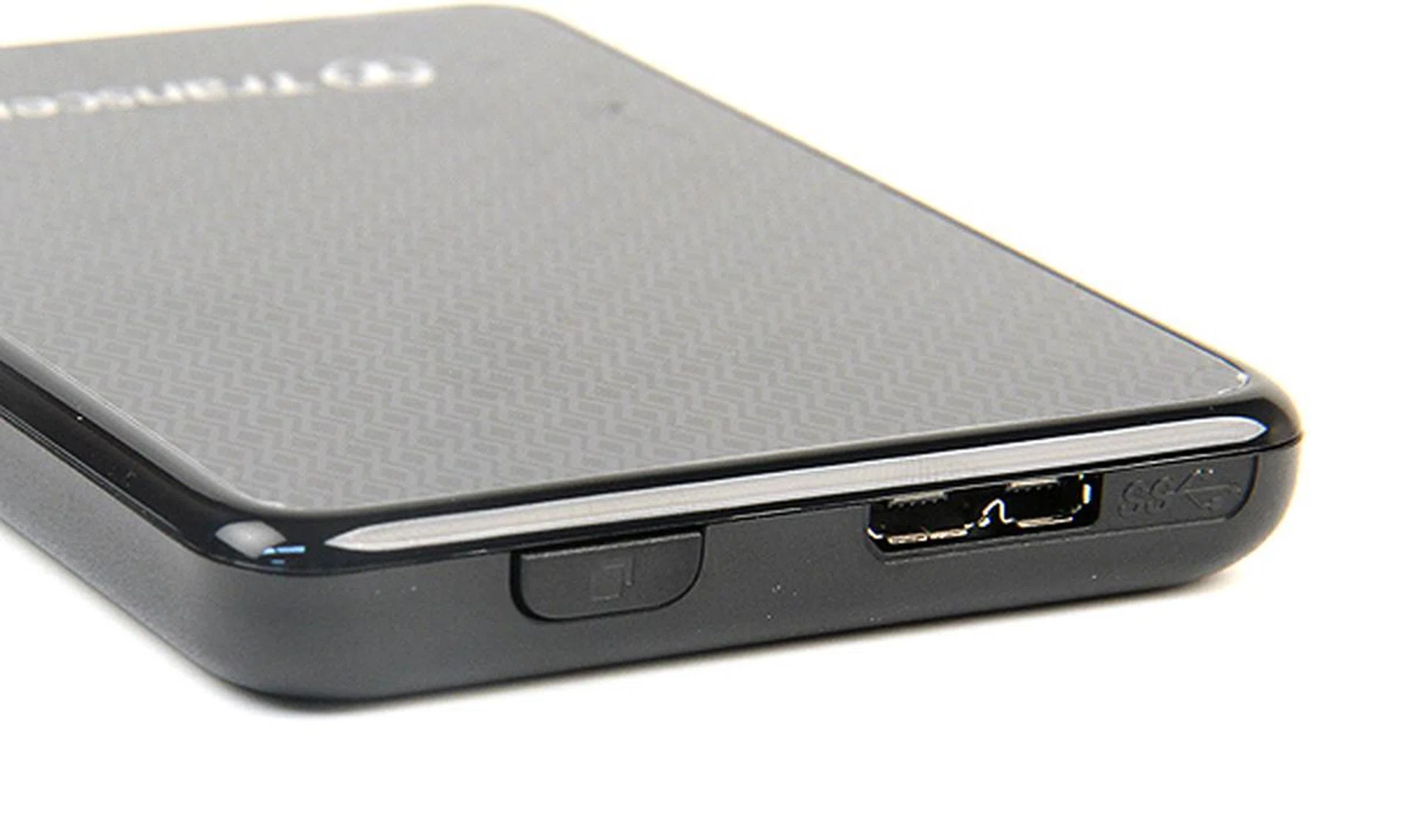 The top side of the drive is a button that enables Transcend's one-touch backup. To the right of it is a standard USB 3.0 micro-B type connector.