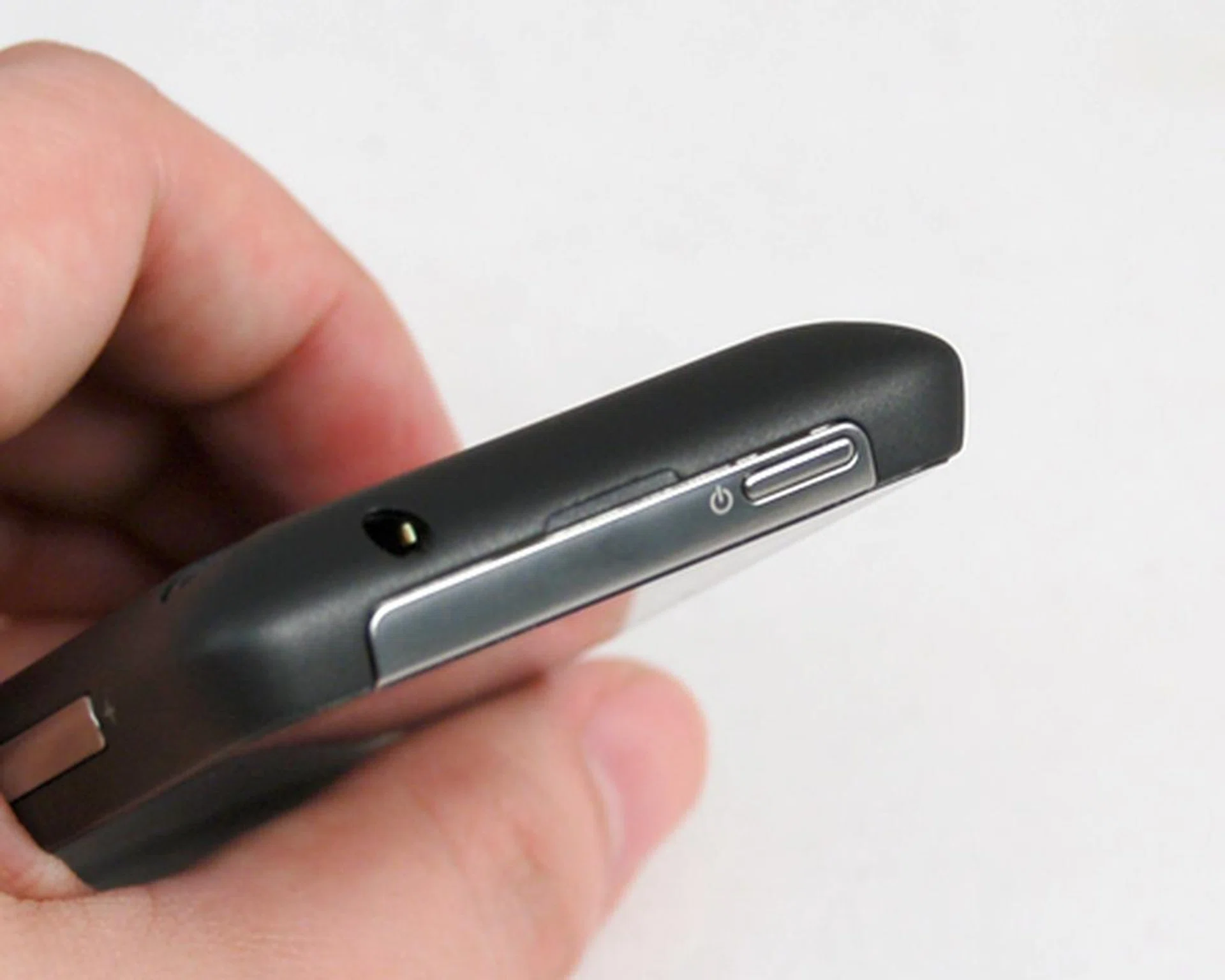 Physical buttons are limited to the volume buttons (at the left profile) and the power button (as shown here) beside the 3.5mm audio port.