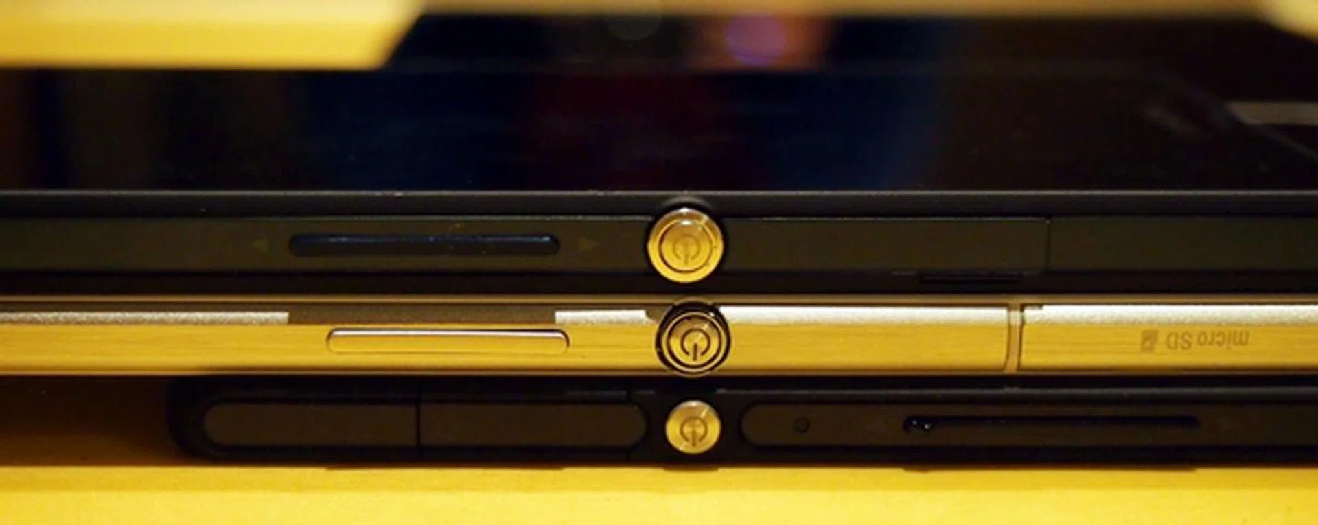 The metallic power button is the signature look of Sony's flagship devices. <br> The Sony Xperia Z (top), the Sony Xperia Z Ultra (center) and the Sony Xperia Tablet Z (bottom).