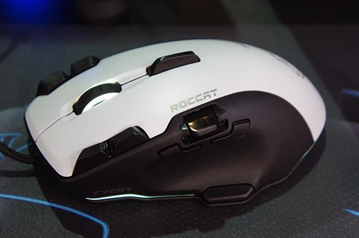 The switch right under the Roccat logo is the Tyon's new X-Celerator two-analog stick that can be customized for in-game commands such as throttling or running.