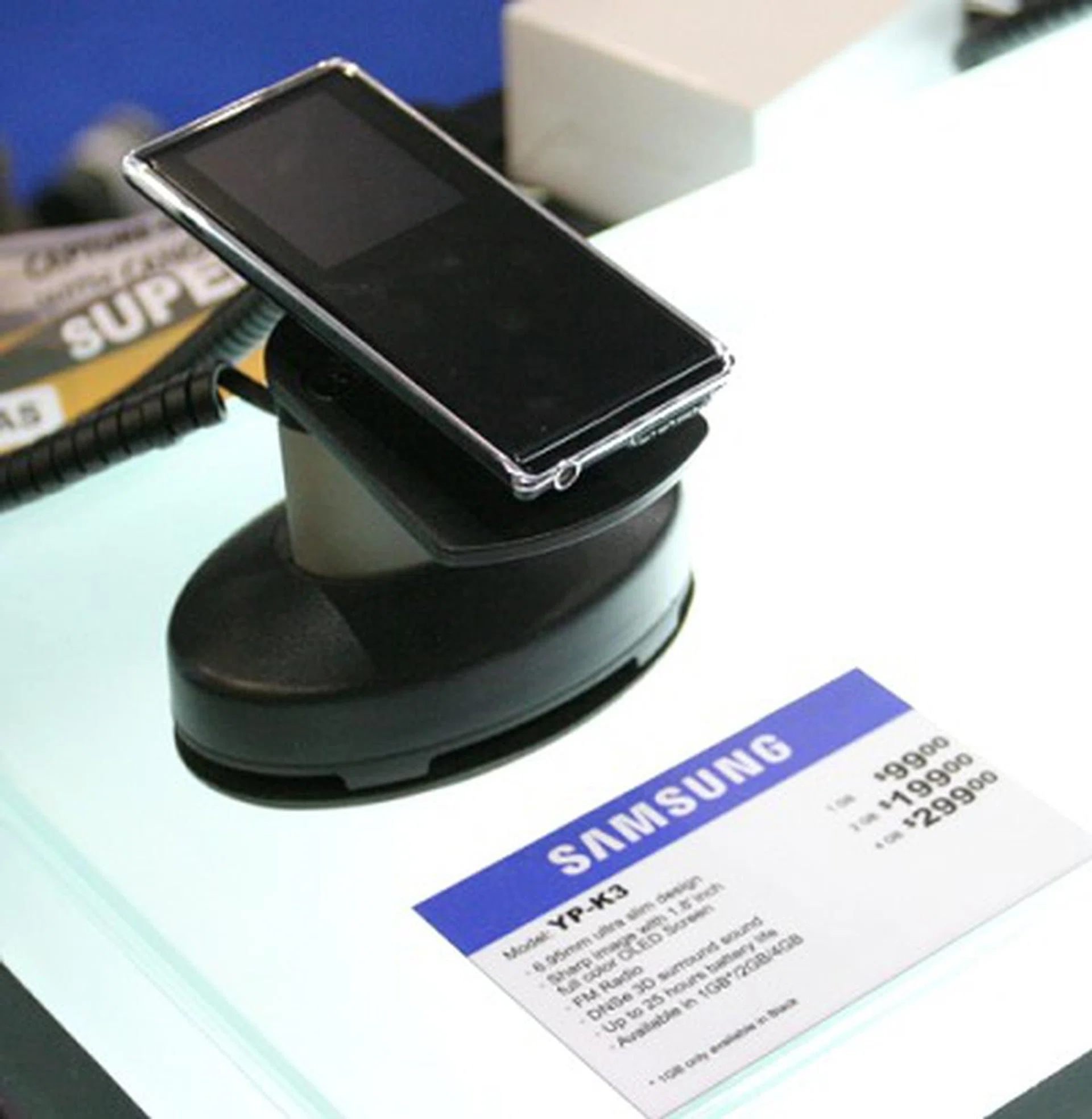  The popular chic Samsung YP-K3 MP3 players are going for $199 and $299 for the 2GB and 4GB models respectively. Features: 6.95mm slim body, OLED screen, FM radio, clock, photo slideshow, USB 2.0 connectivity and boast 25 hours of playback time.  