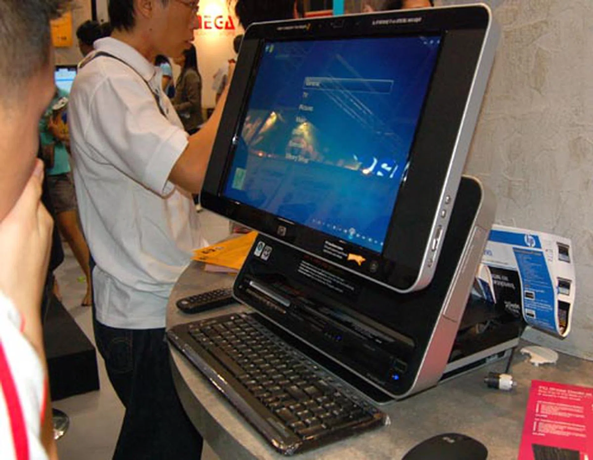  HP's very own unique TouchSmart IQ770a PC which was unveiled in Korea a few months ago was going for $3299 with a lot of freebies thrown in. The entire PC can be navigated through its 19-inch touch sensitive display. Within is an AMD Turion 64 X2 TL-52, Windows Vista Home Premium, 2GB DDR2 RAM, 320GB SATA HDD and 256MB NVIDIA Geforce Go 7600 graphics.  