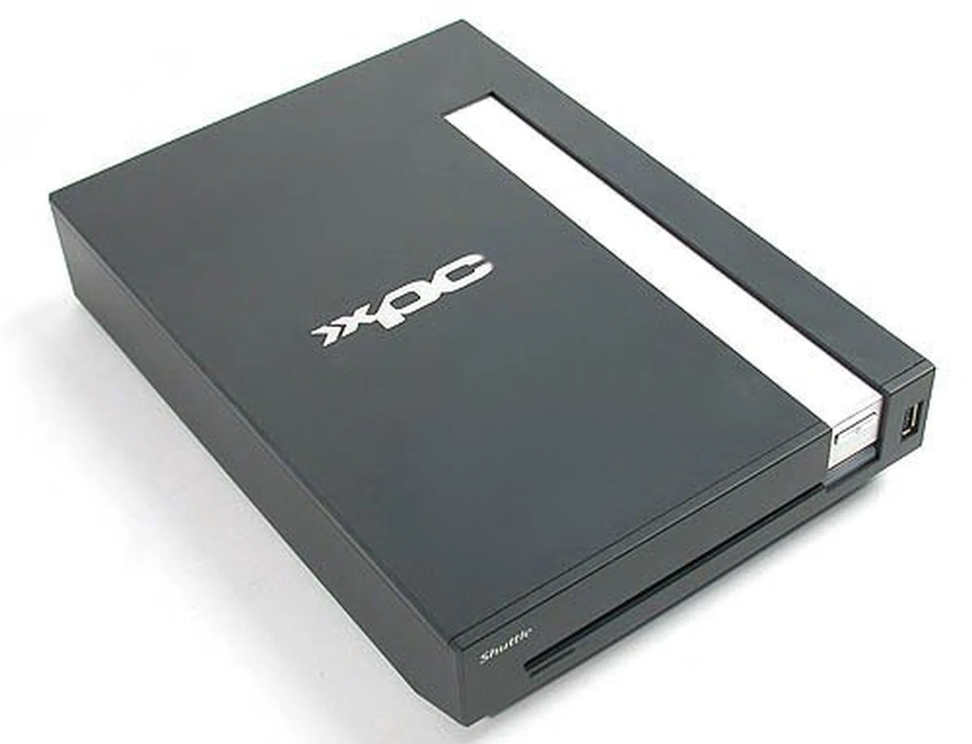 Longer and heavier than a Mac Mini, it's also more powerful than its Apple competitor. Upgrade options seem a bit limited, especially graphics-wise but it's early days yet. Overall, the Shuttle XPC X100 presents itself as a mildly configurable petite little media PC more than anything else.