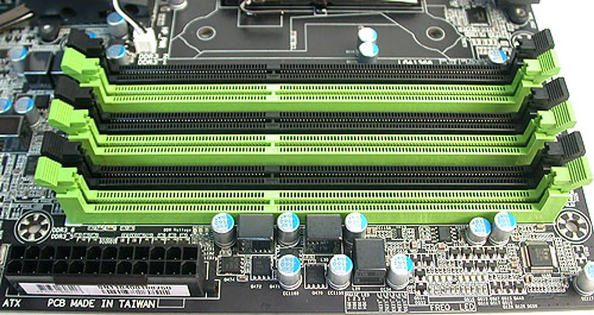 The usual six DIMM slots for the triple-channel memory architecture on the Intel X58. Gigabyte says that they support up to 24GB of memory running at DDR3-2200MHz.